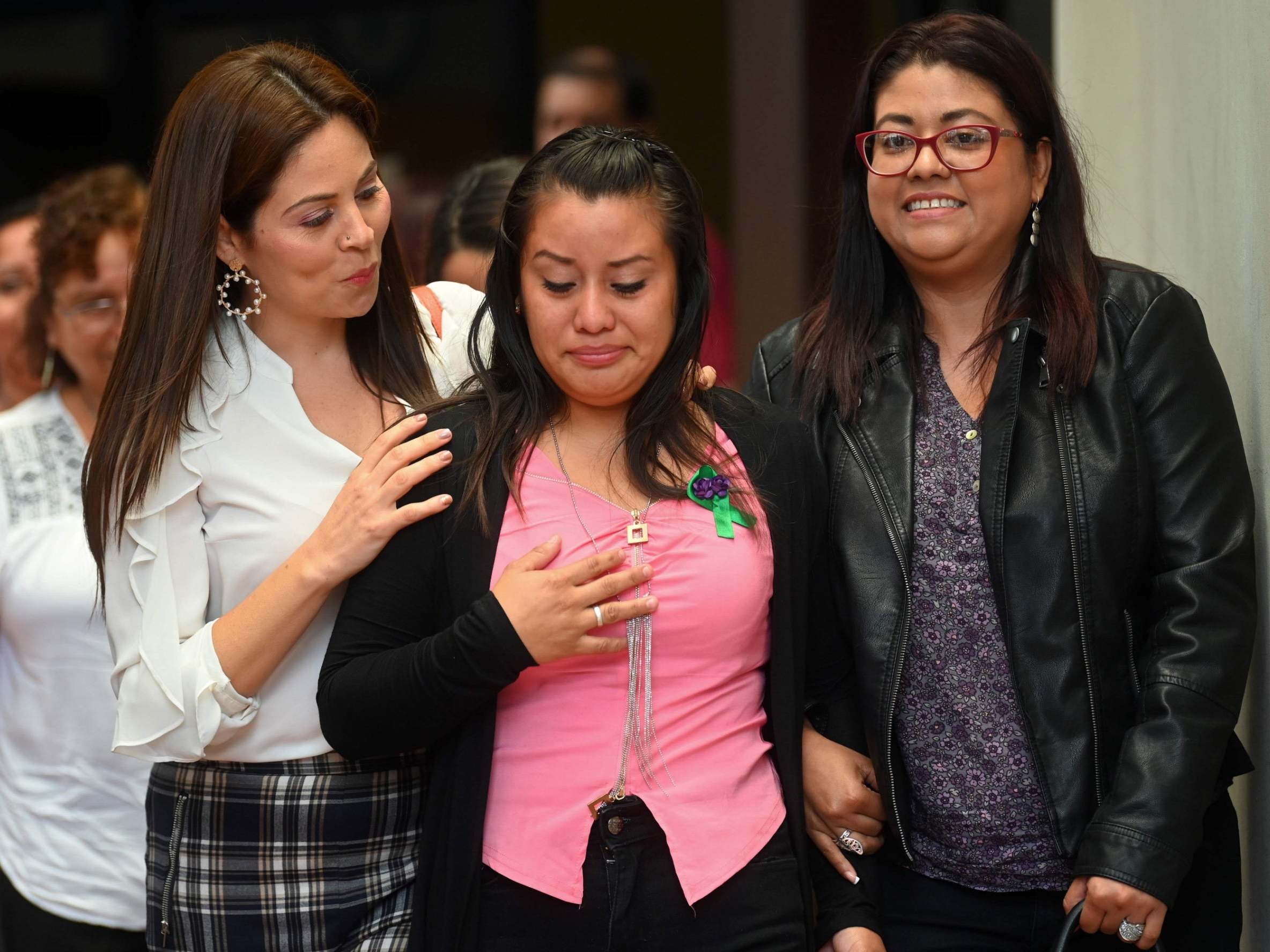 Hernandez leaves court with her lawyers after being cleared of murder