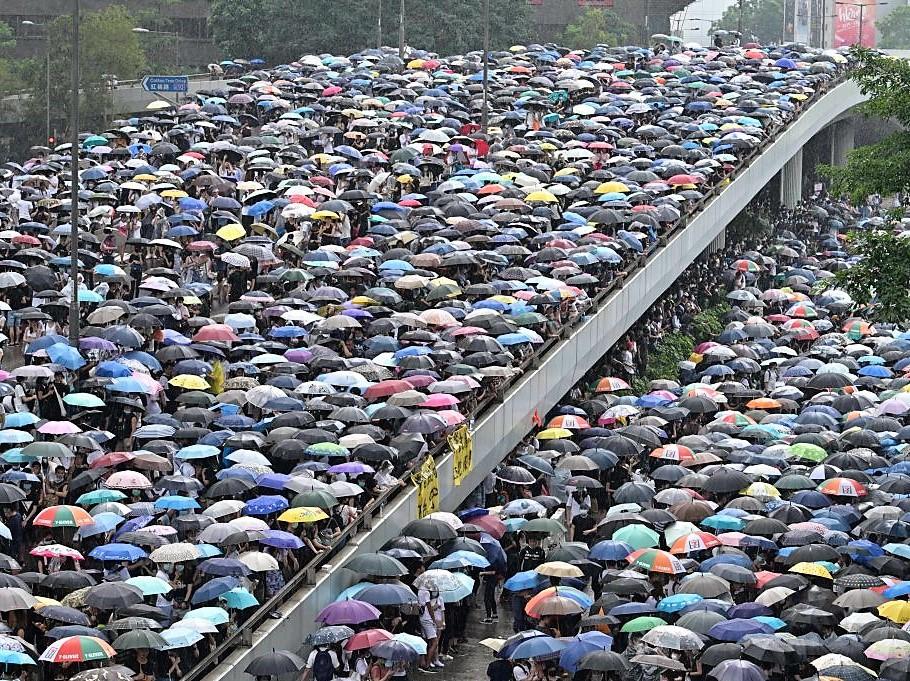 Protesters occupy roads near government headquarters in Hong Kong this summer