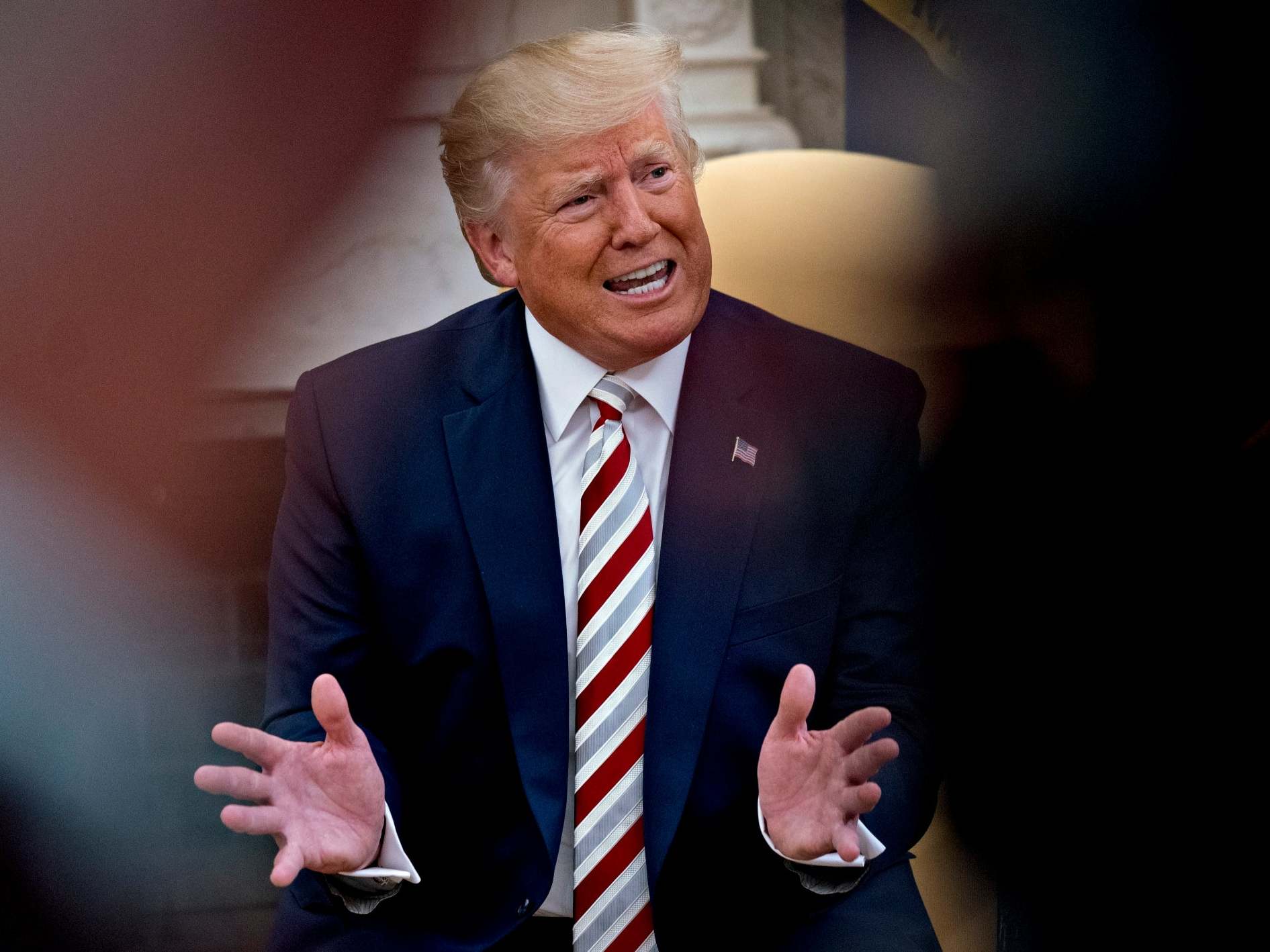 Donald Trump speaks during a meeting with Klaus Iohannis, Romania's president, in the Oval Office on 20 August