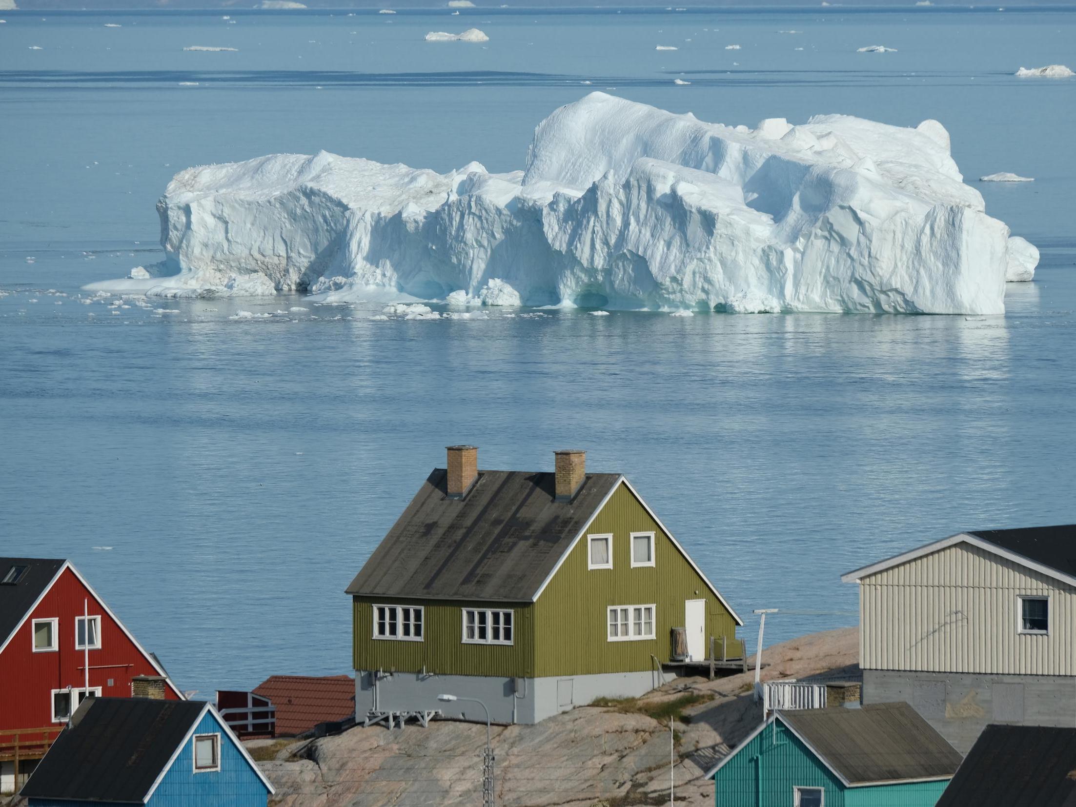 An iceberg floats in Greenland's Disko Bay during unseasonably warm July weather.