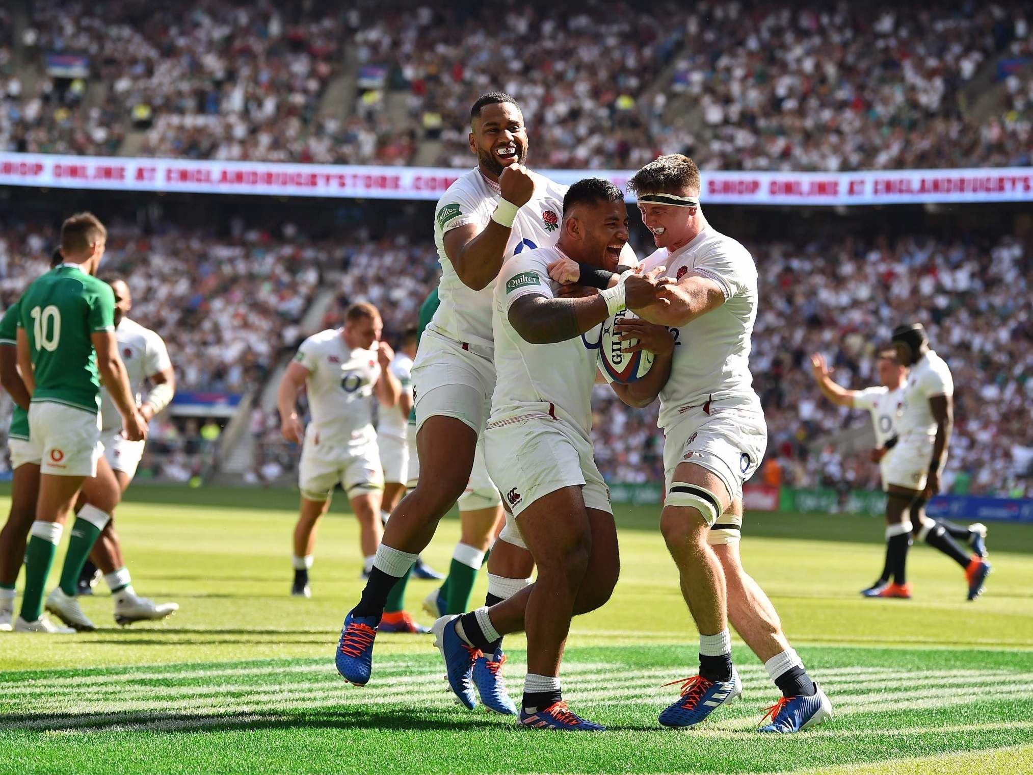 Manu Tuilagi celebrates scoring a try