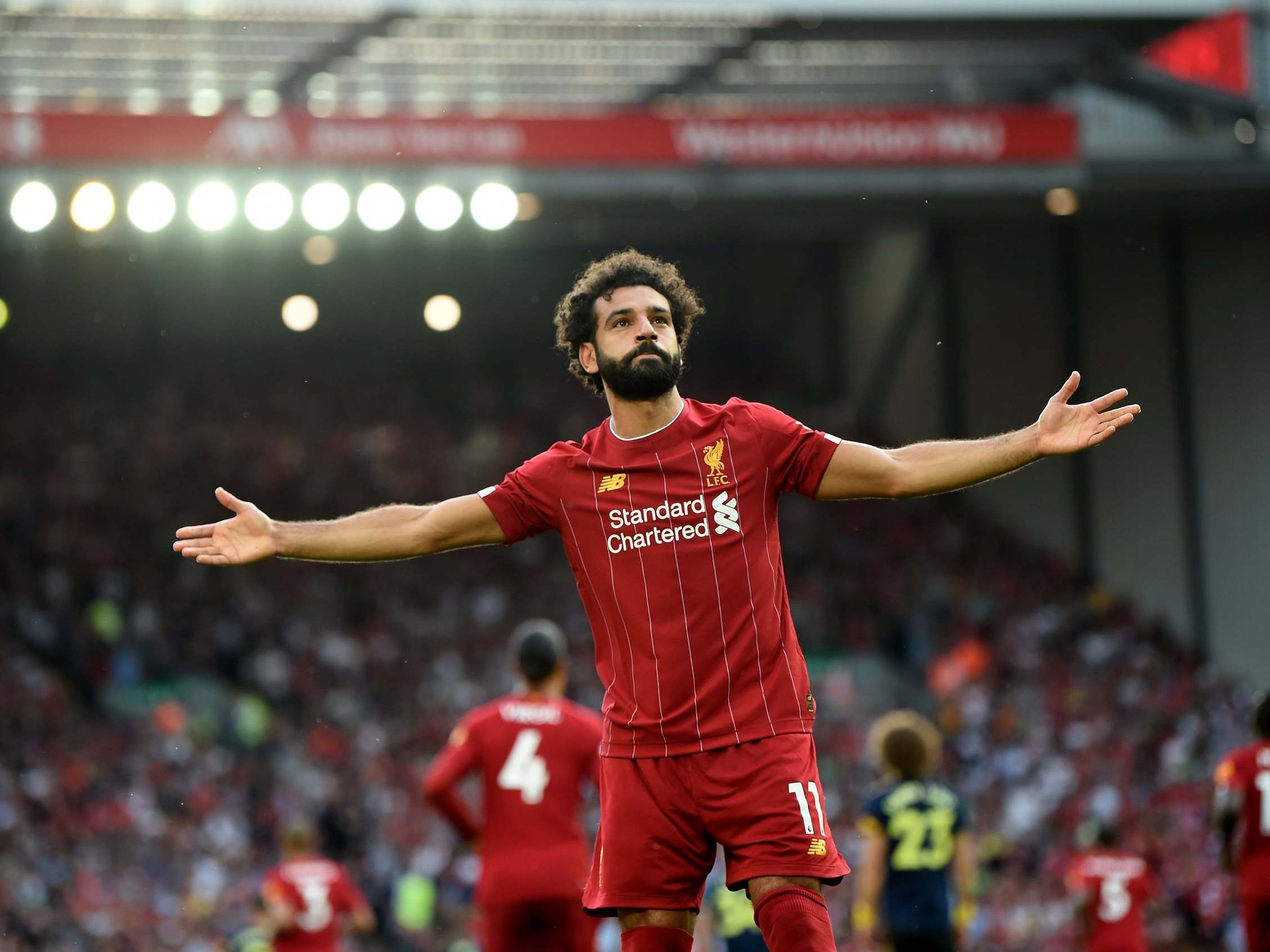 Mohamed Salah celebrates after scoring from the spot