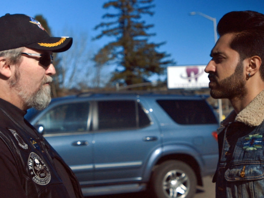 Mobeen Azhar (right) in his documentary A Black and White Killing: The Case That Shook America