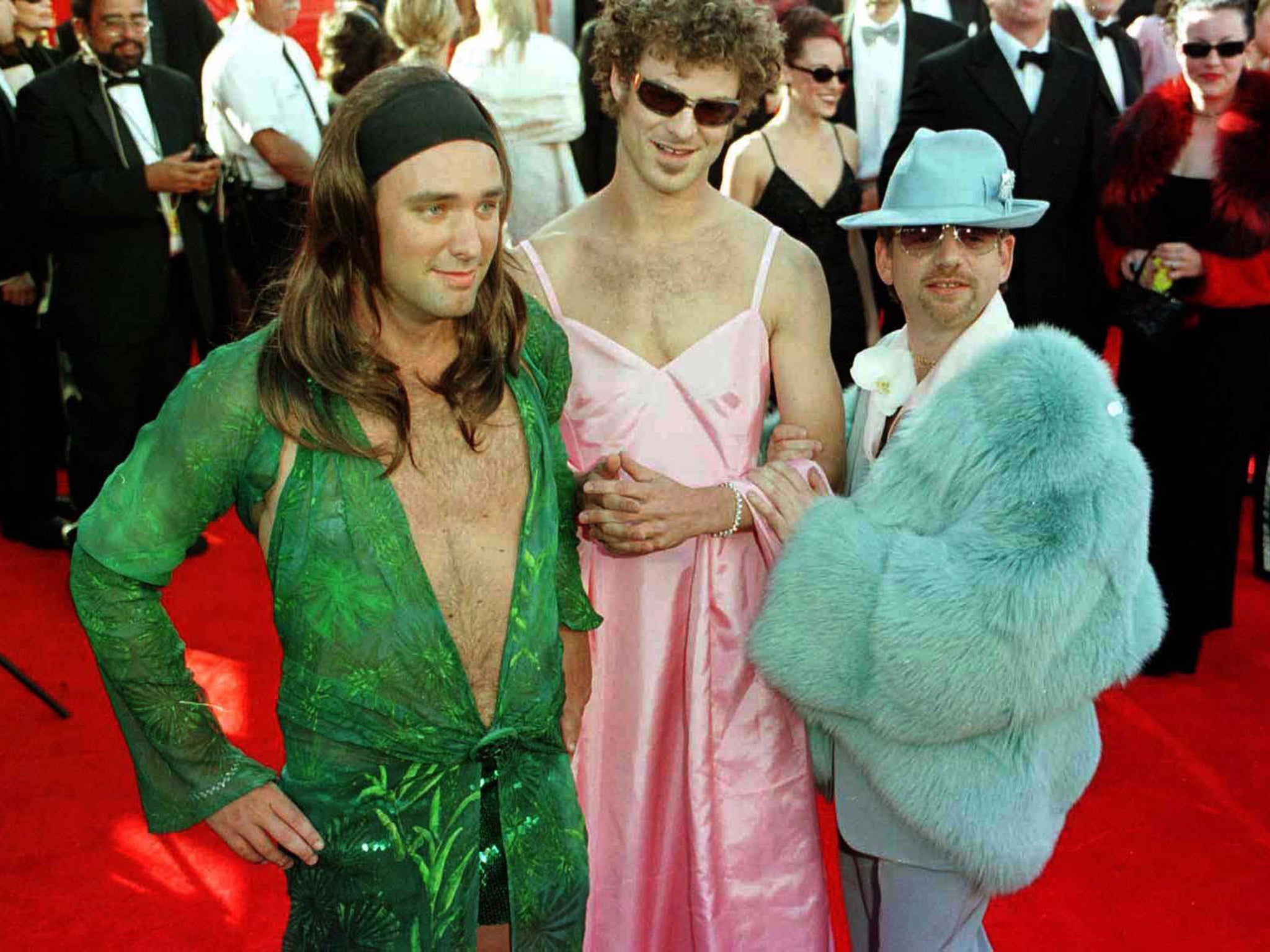 The South Park creators (left and centre) arrive at the Oscars dressed in drag