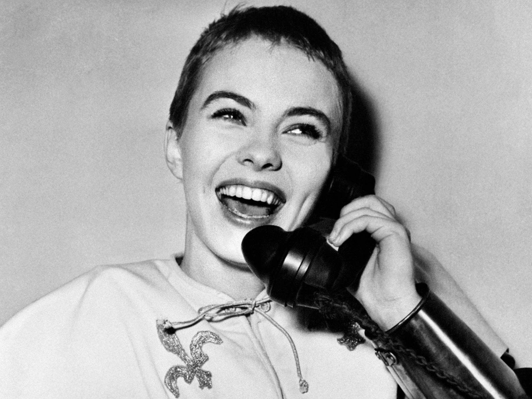 Jean Seberg on a phone call during the filming of ‘Joan of Arc’, directed by Otto Preminger, in 1957, in London