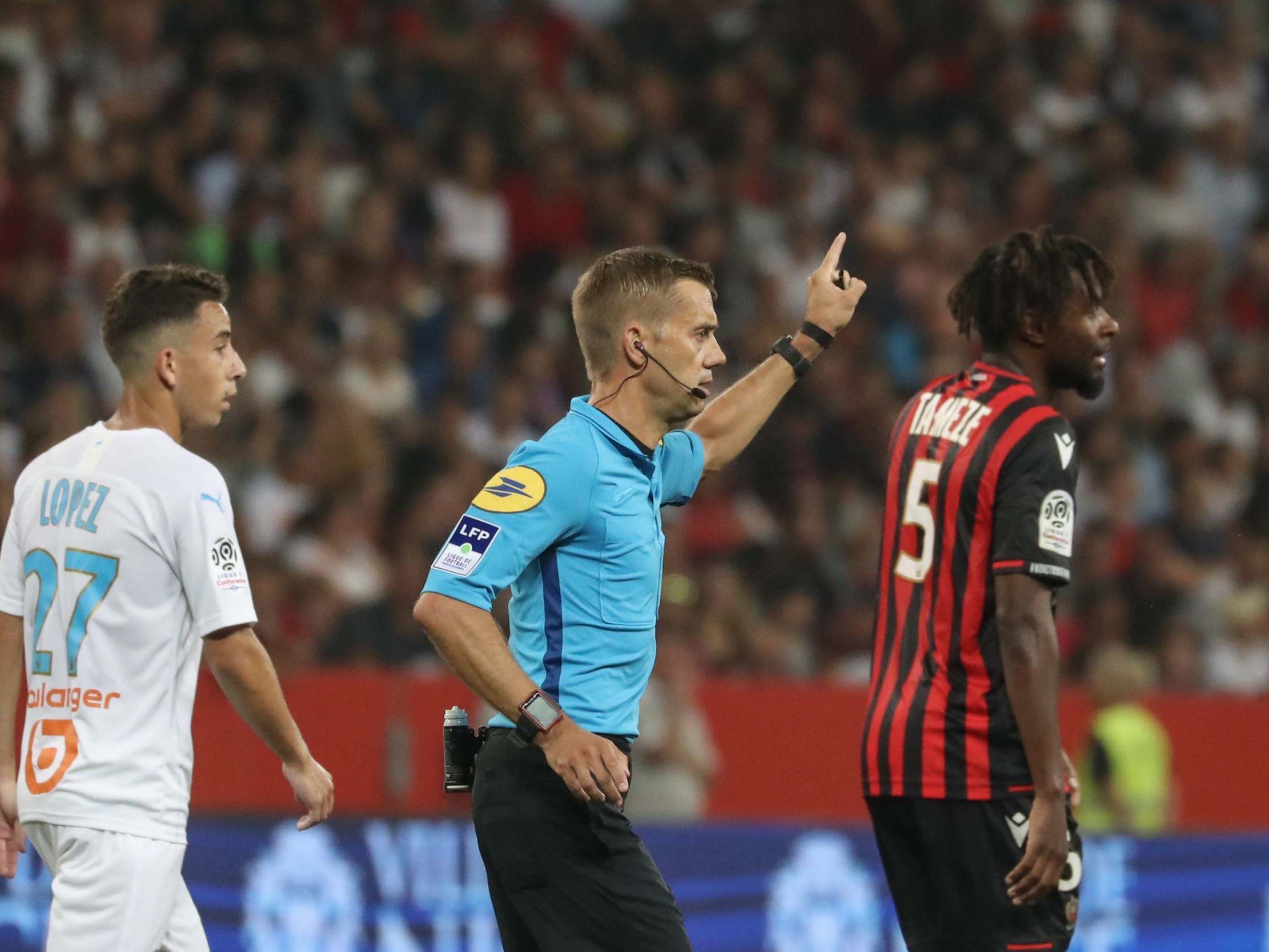 Referee Clement Turpin took the players off due to the homophobic banner and chanting