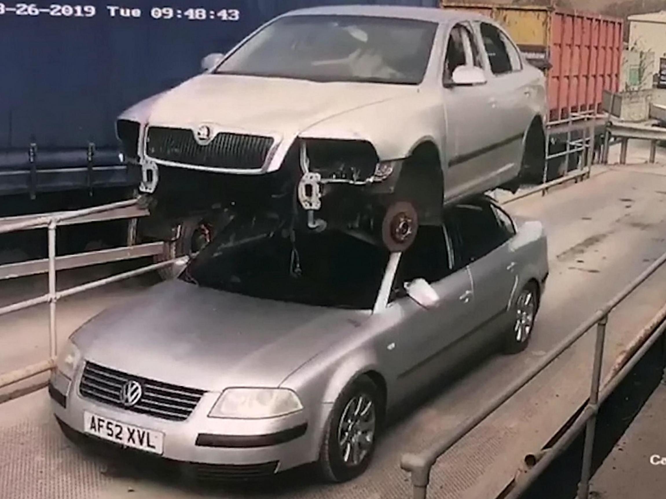 Glyndwr Wyn Richards was given a fine and three penalty points after he was caught driving a car with another car on its roof in Aberystwyth, Wales, 26 March 2019.