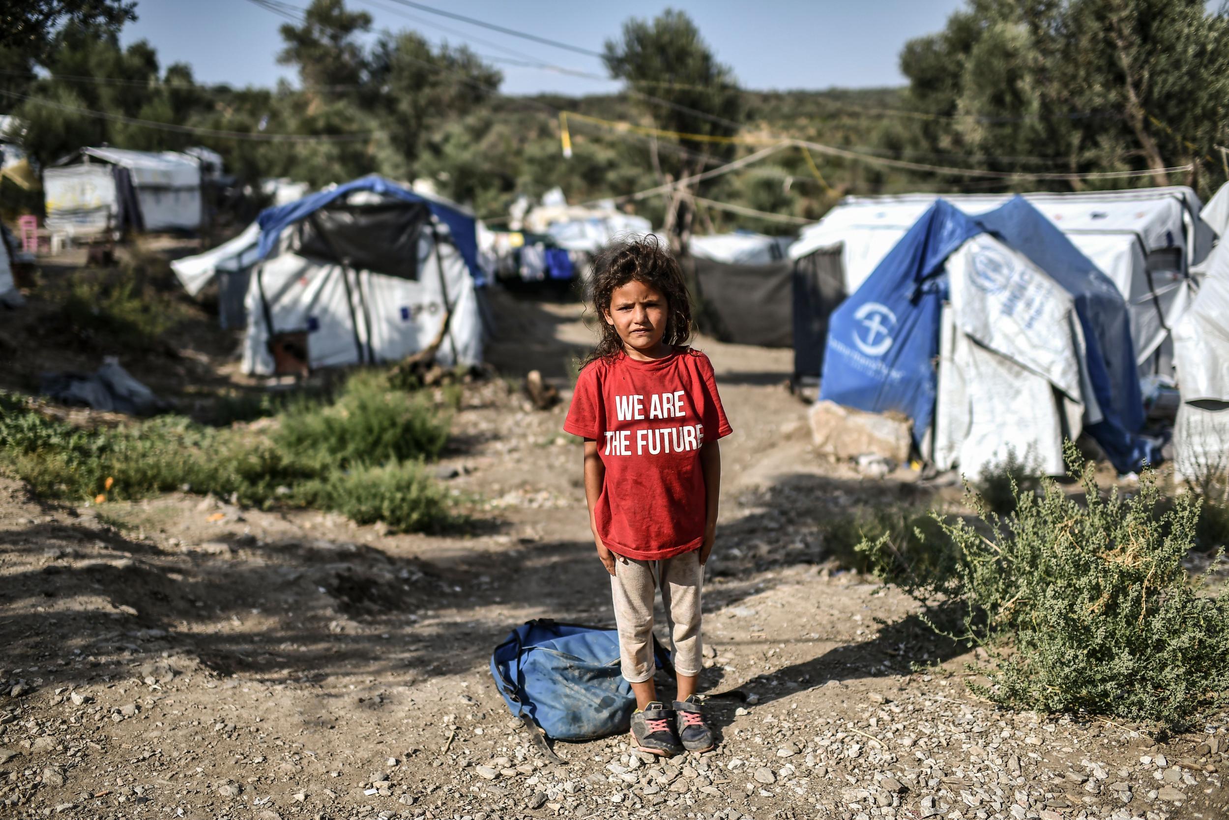 A young girl at a camp next to the Moria refugee camp in the island of Lesbos (AFP/Getty)