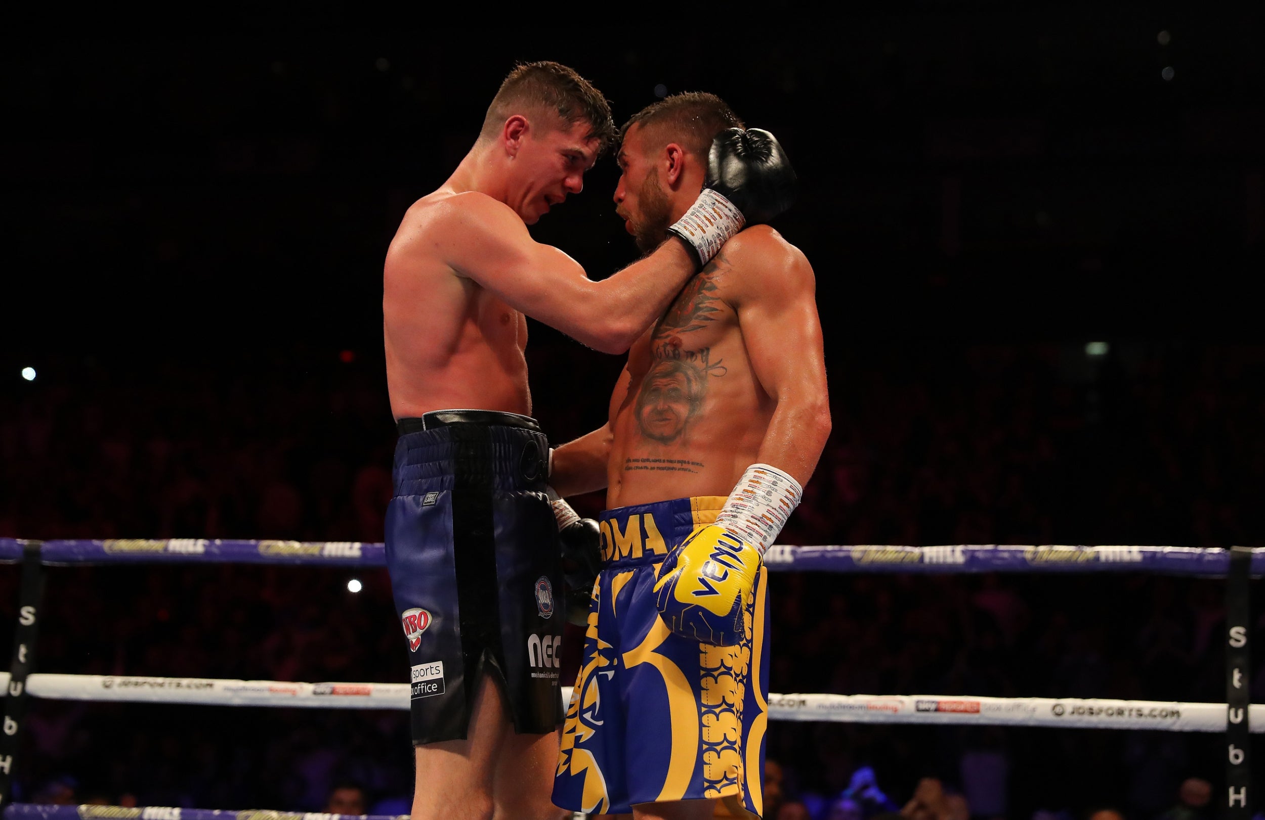 The fighters embrace after the final bell