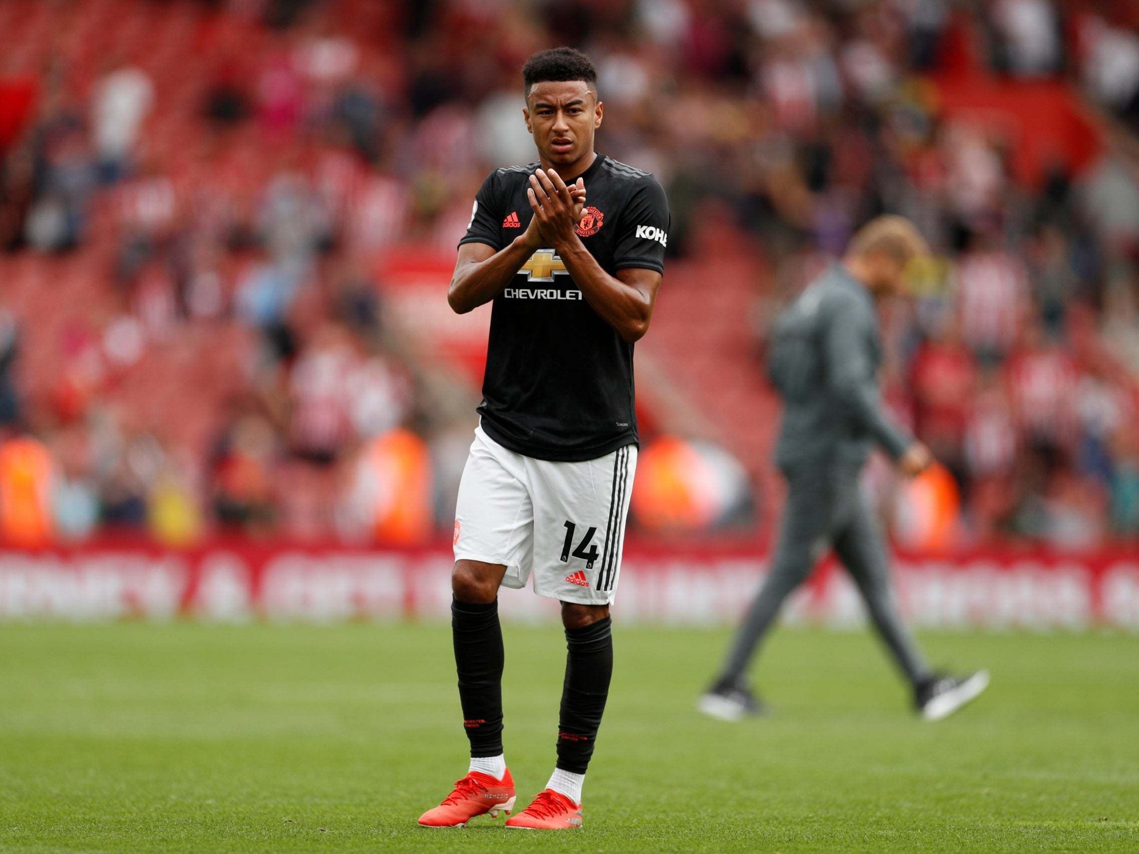 Jesse Lingard applauds the Man United fans