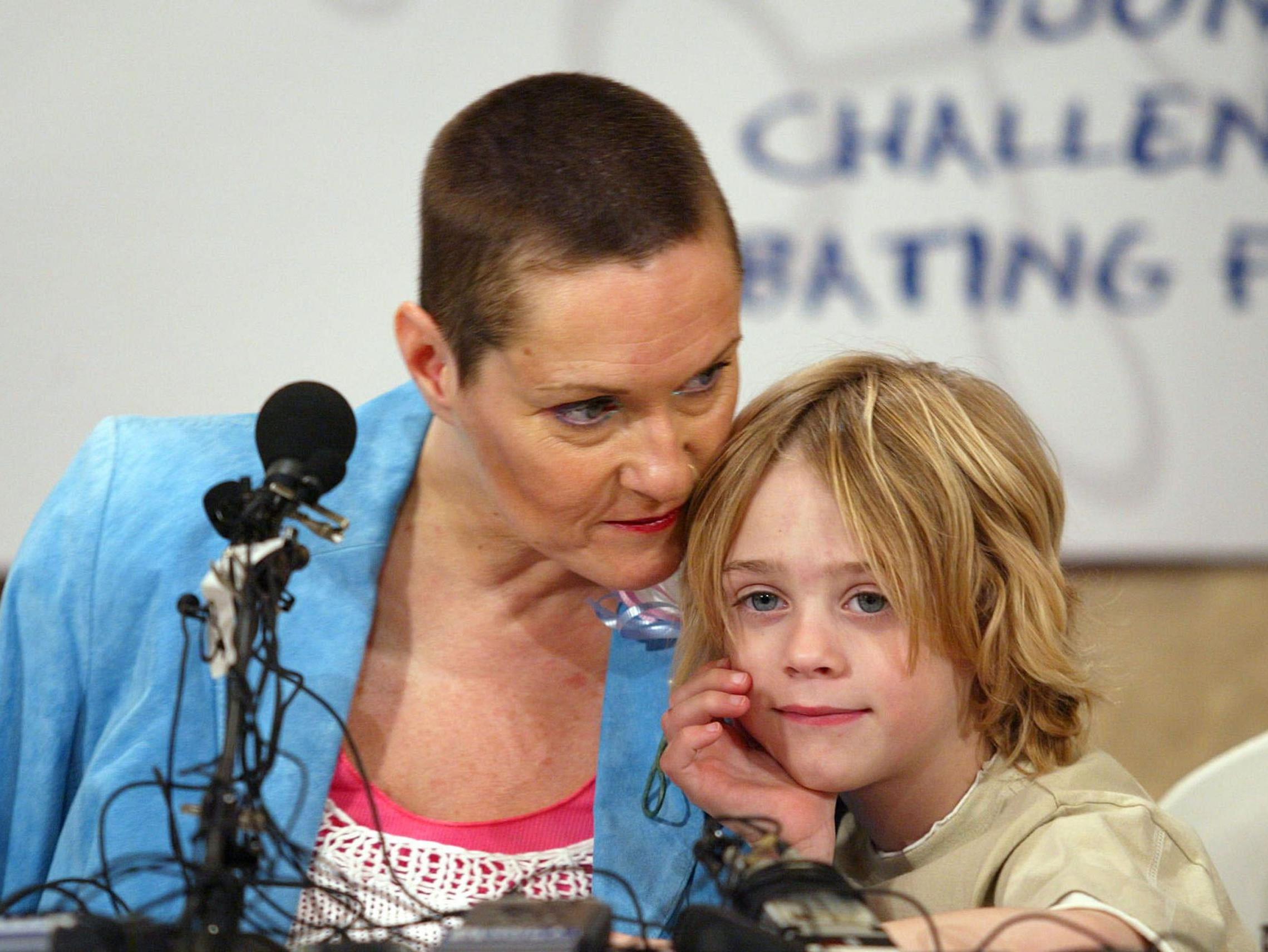 British artist Alison Lapper attends a news conference with her son Parys on April 24, 2006