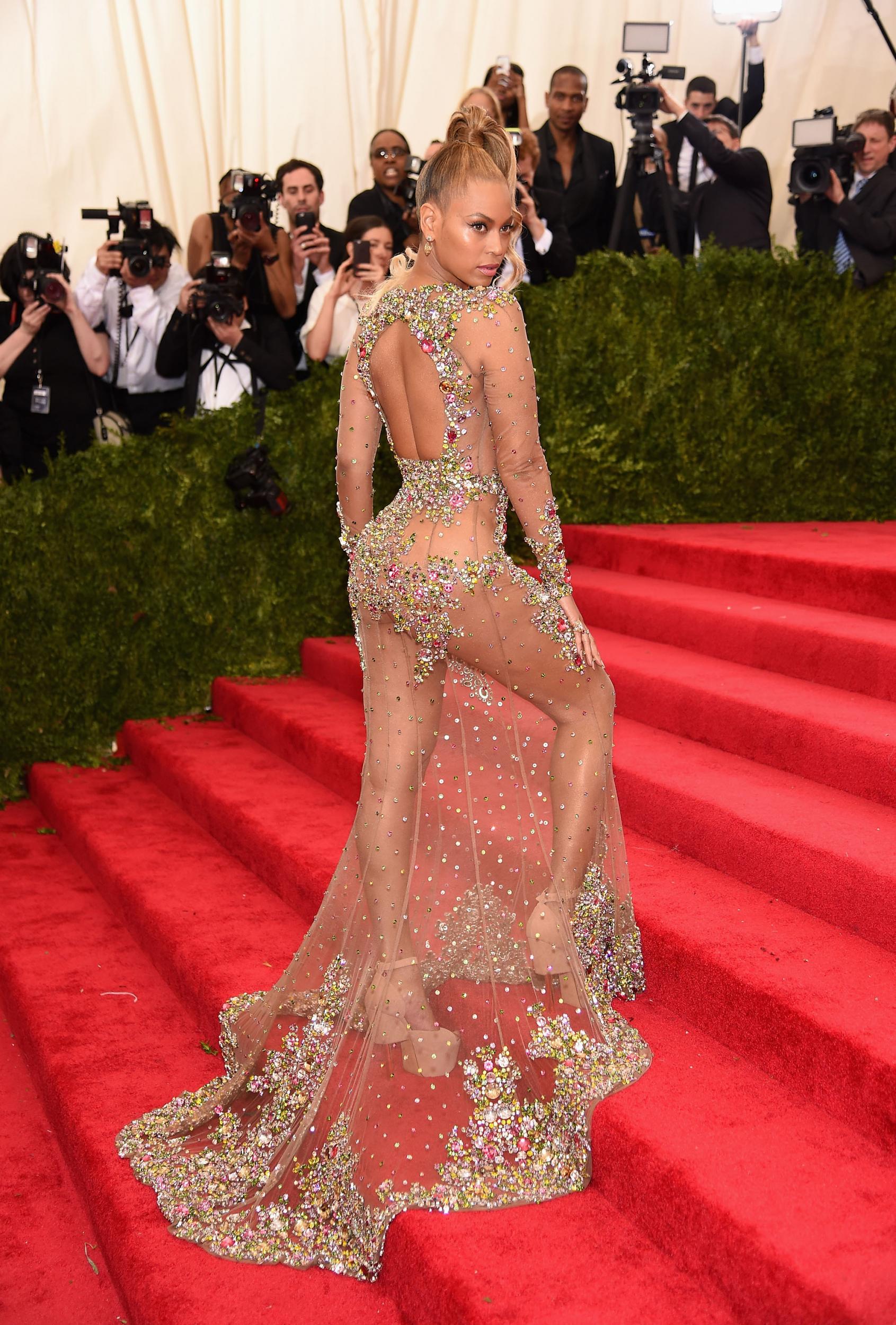 The star opted for a sheer, embellished gown created by French fashion house Givenchy for the 2015 Met Gala, the theme of which was 'China: Through The Looking Glass'.  Beyoncé wore her hair in a slicked back, high ponytail in order to place further emphasis on the exquisite design.