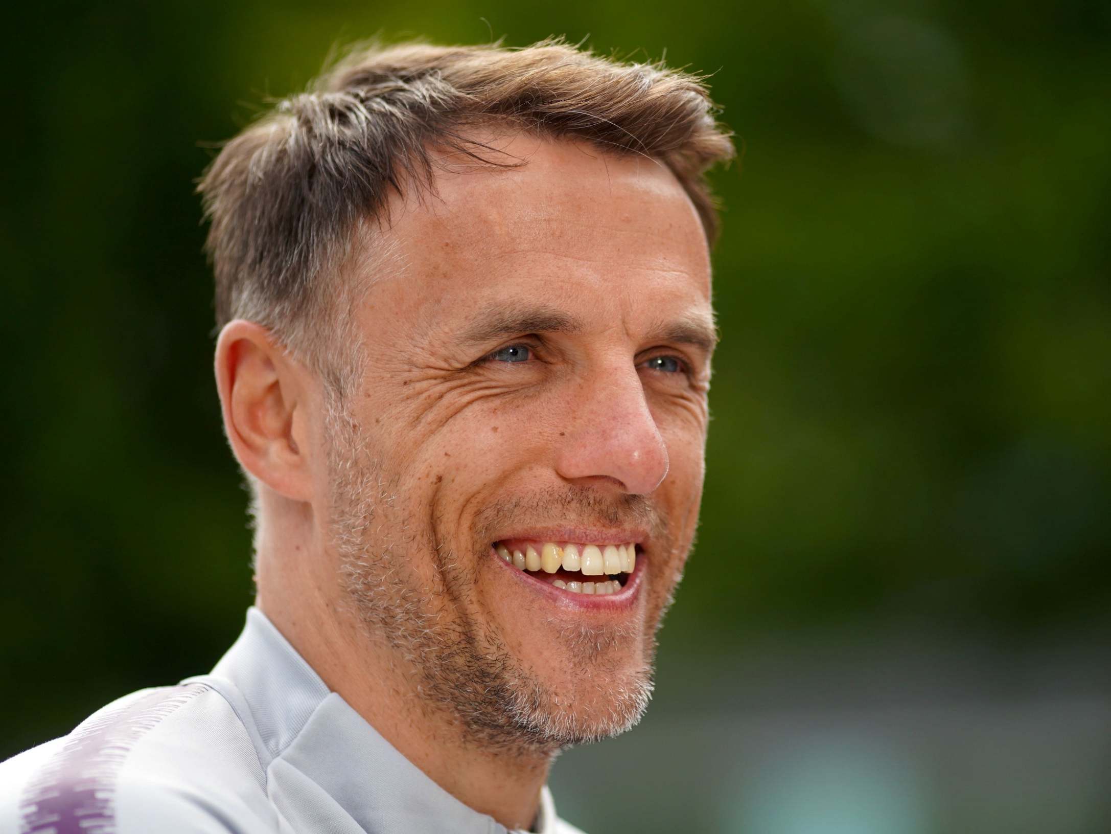 Phil Neville is flattered by talk linking him with the USWNT