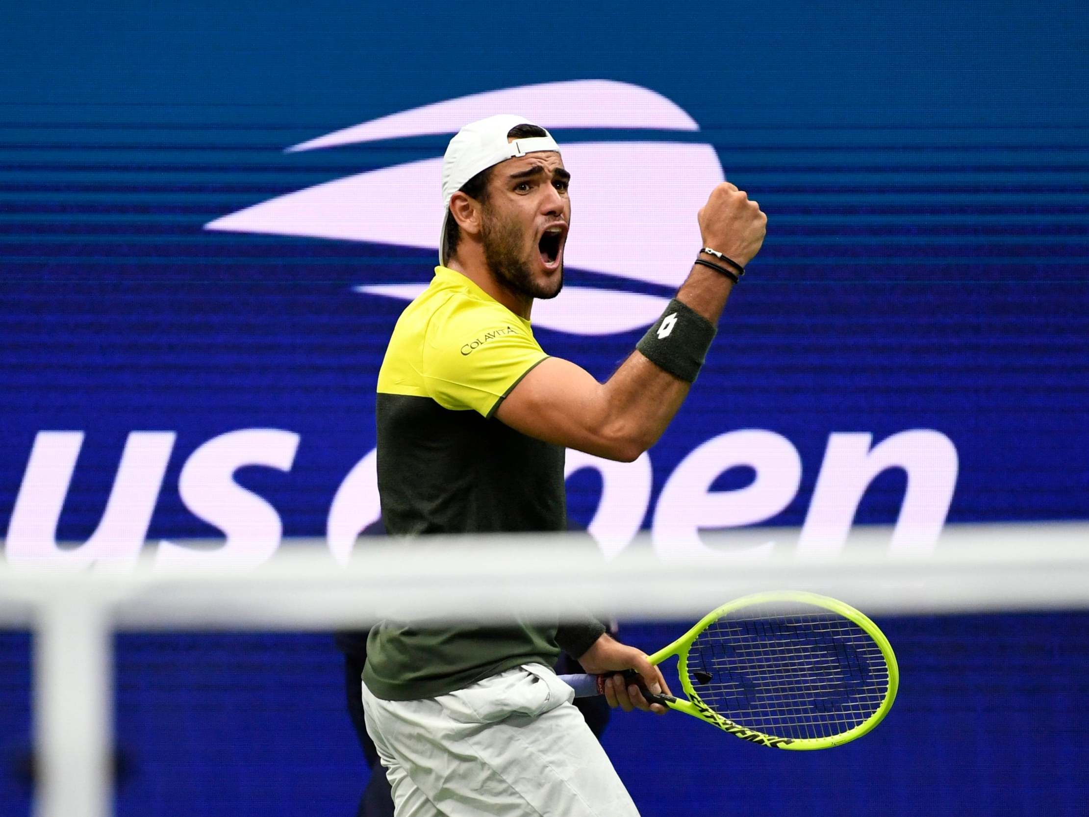 Matteo Berrettini celebrates after beating Gael Monfil to reach the semi-finals