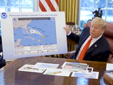 Trump forced to deny doctoring map after pen spotted on desk