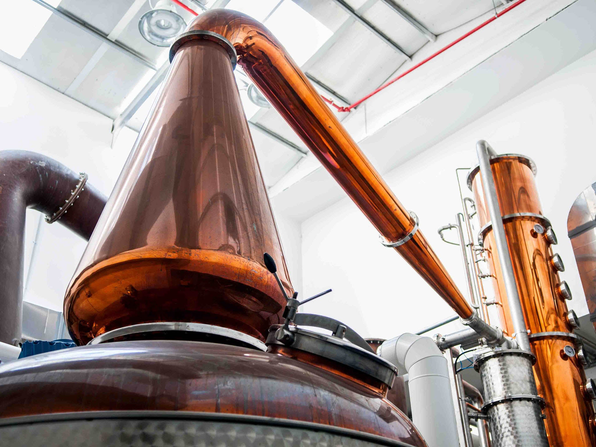 The distilling process for whisky here uses copper stills (M&amp;H Distillery)