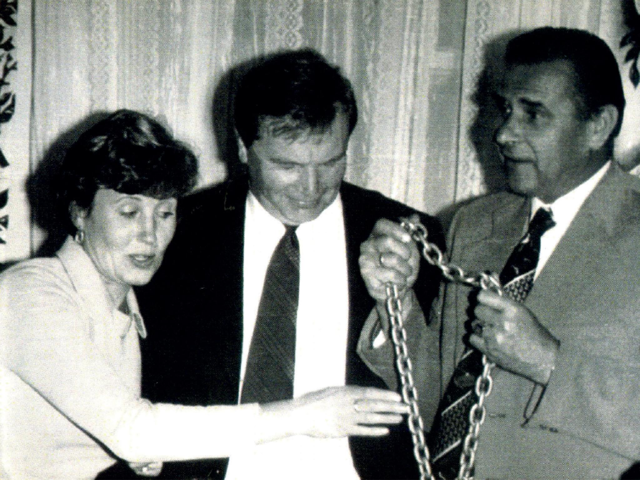 The renowned footballer Lev Yashin (right), a friend of the Lebedevs, congratulating Alexander’s father on his 50th birthday, with his mother, Maria Sergeyevna