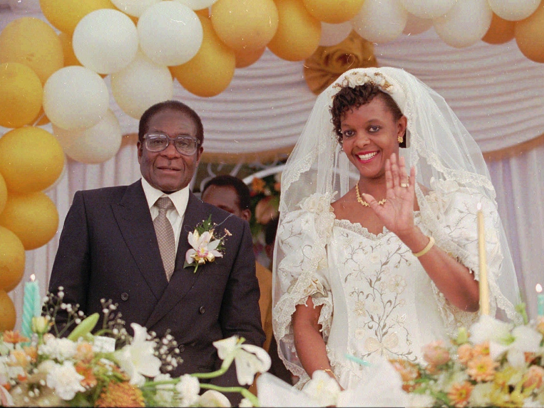 He married his second wife, Grace Marufu, in 1996