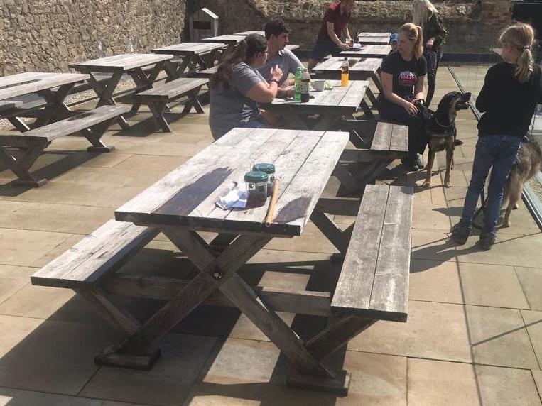 Andrew Perkin visited Knole House last month and saw two traps in the cafe (pictured in the foreground) which he said each contained 100 wasps