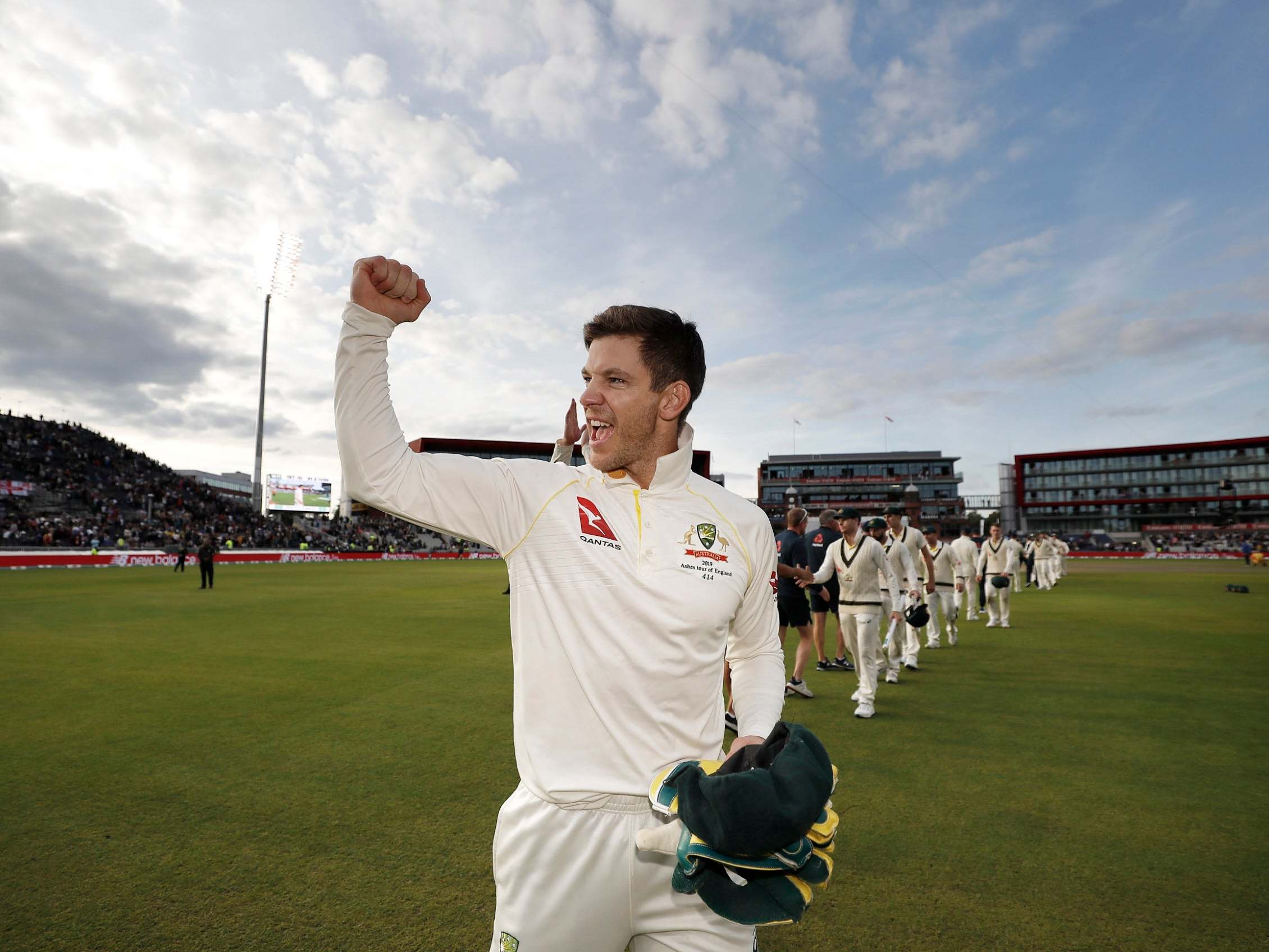 Tim Paine celebrates after Australia retain the Ashes