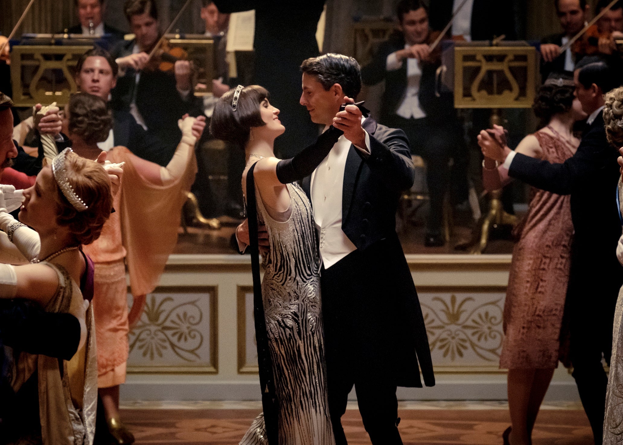 Michelle Dockery as Lady Mary Talbot, centre left, and Matthew Goode as Henry Talbot in a scene from Downton Abbey