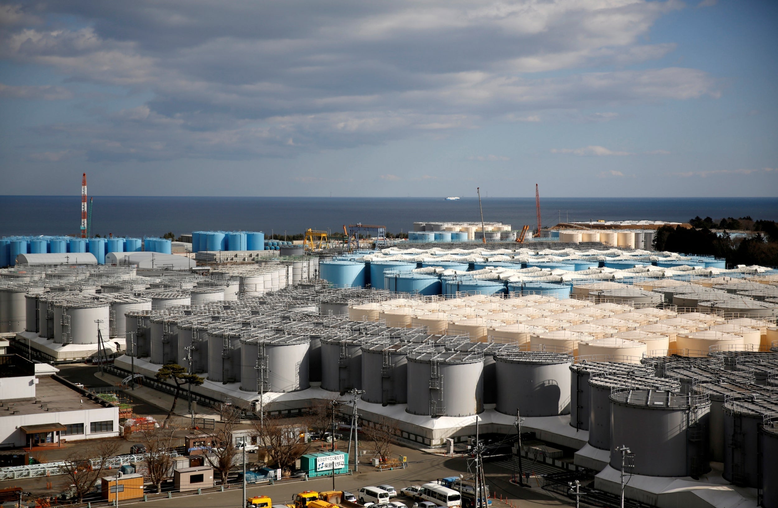 Storage tanks for radioactive water are seen at Tokyo Electric Power Co's tsunami-crippled Fukushima Daiichi nuclear power plant in Okuma town