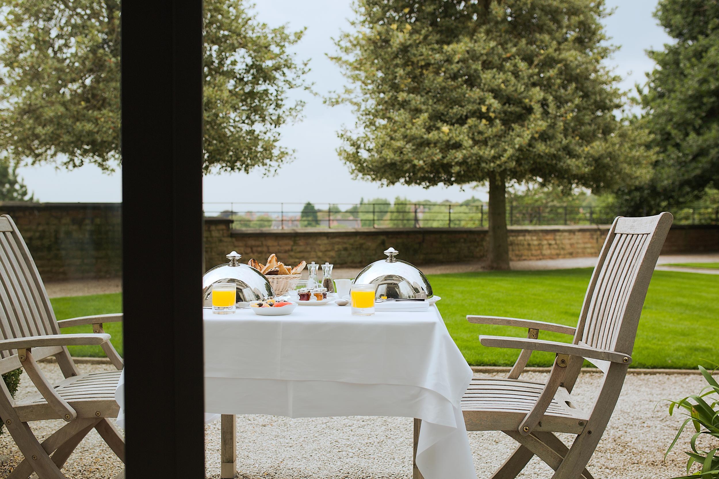 Breakfast on Hart's garden room terrace