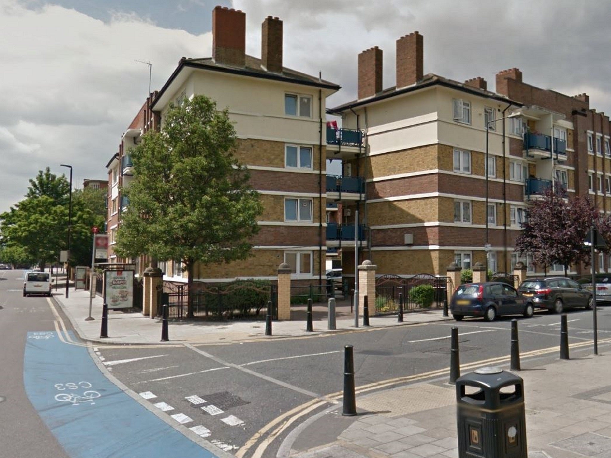 Google street view image of Bazely Street, at the junction with Poplar High Street, in London.