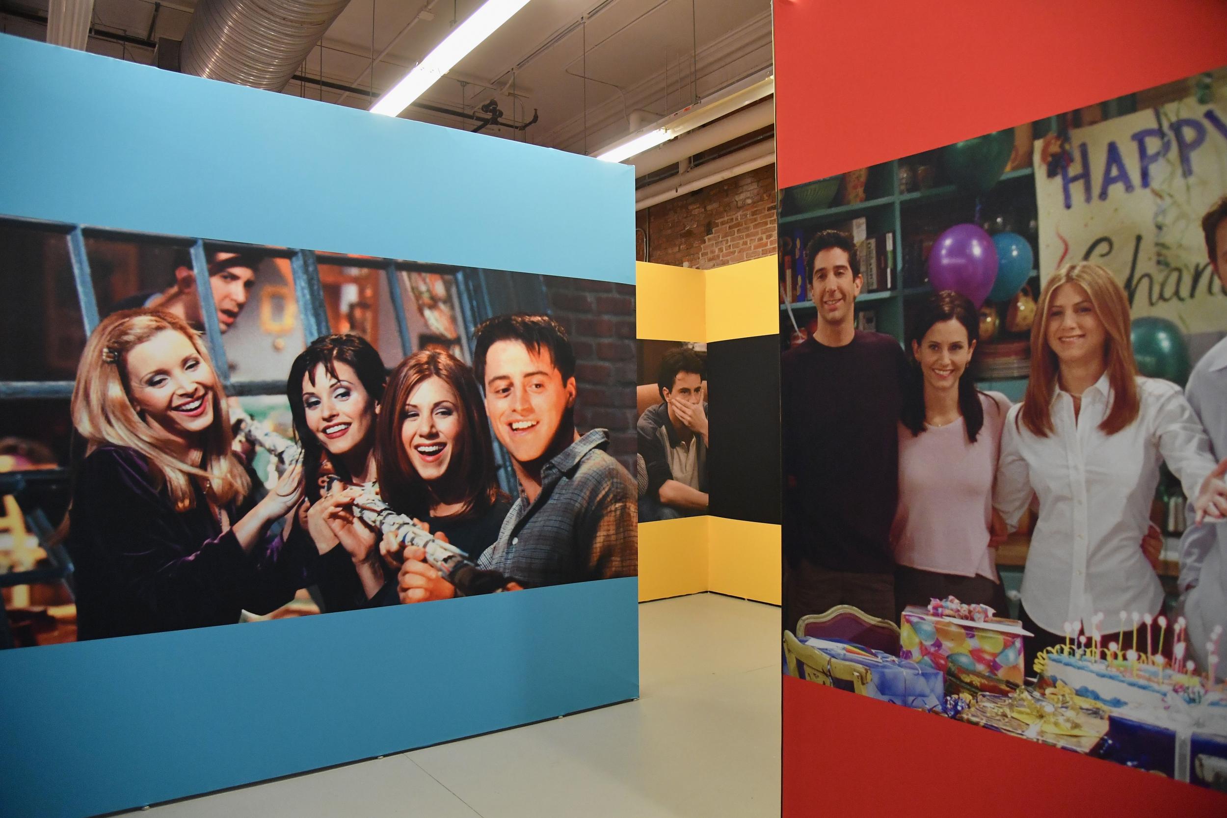 Large posters of the cast greet visitors at the Friends pop-up. (ANGELA WEISS/AFP/Getty Images)