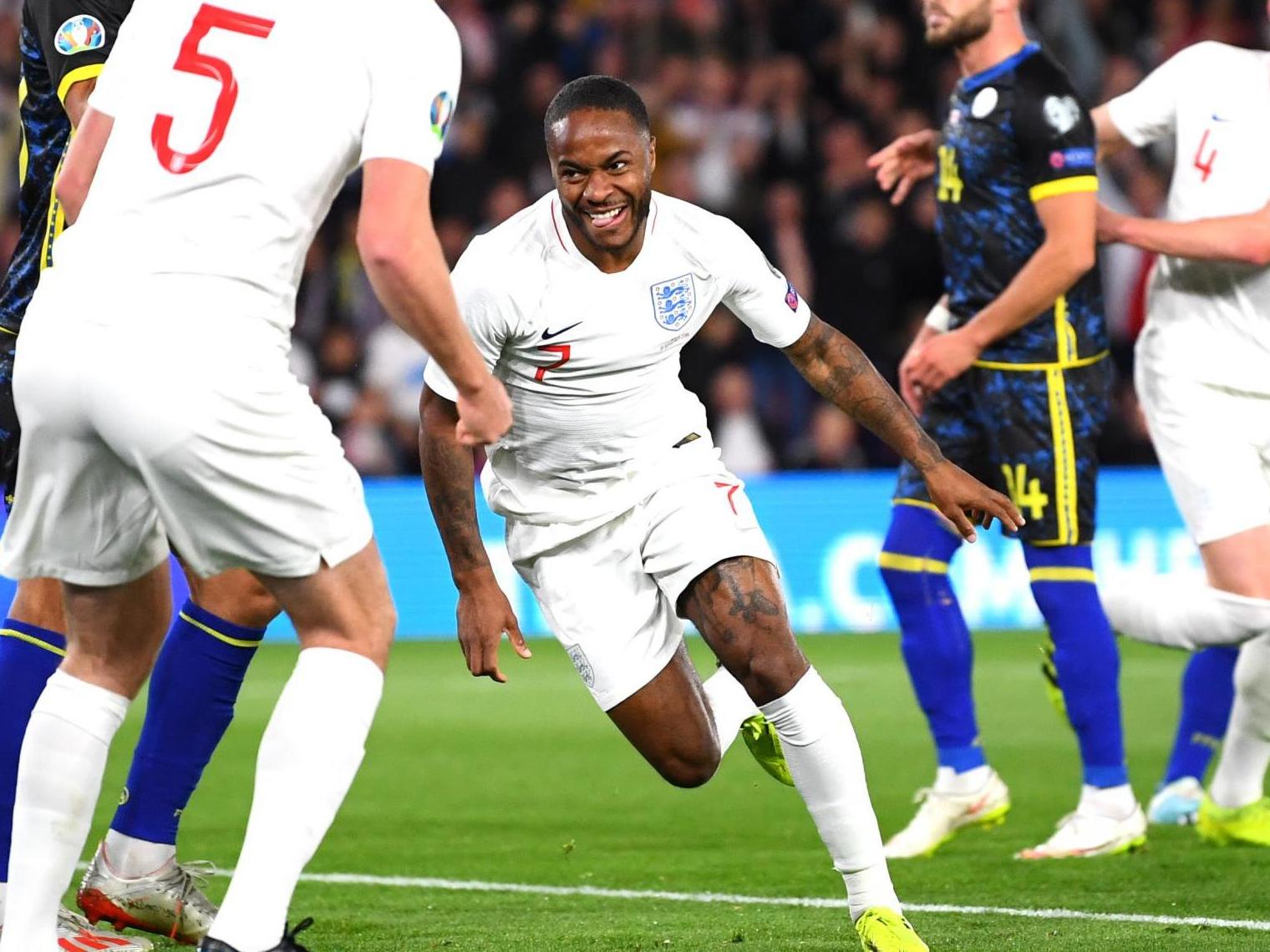 Raheem Sterling celebrates after equalising for England with a close-range header