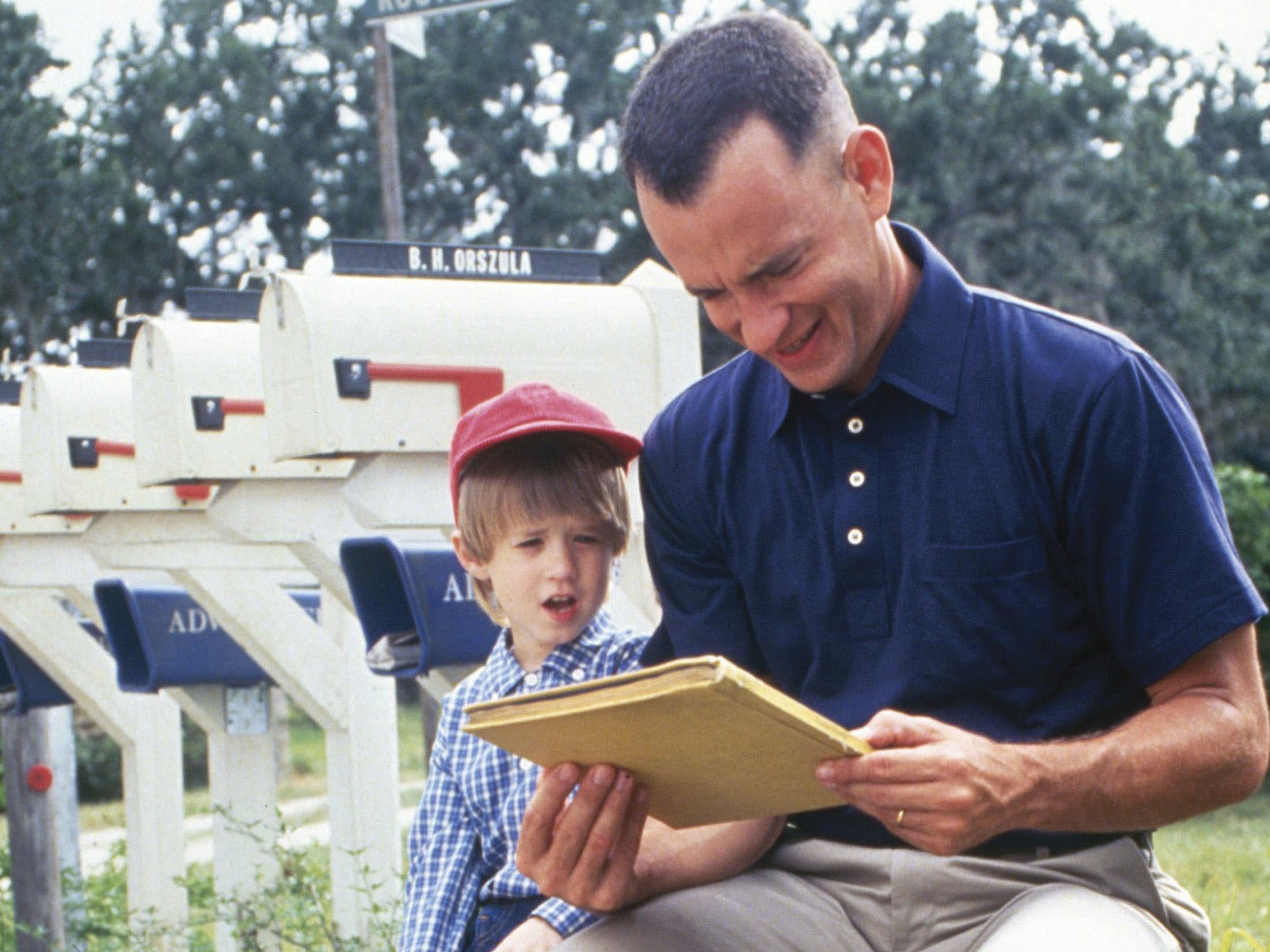 A six-year-old Osment with Tom Hanks in ‘Forrest Gump’, 1994 (Paramount/Kobal/Rex)