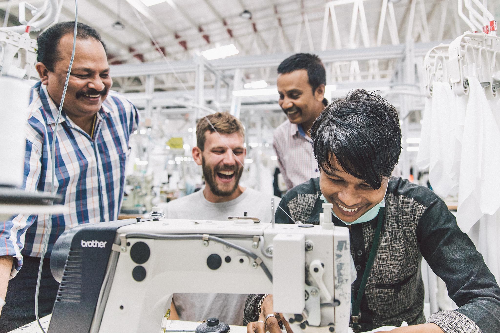 Mart Drake-Knight (second from left) and co at work in a Teemill factory in India