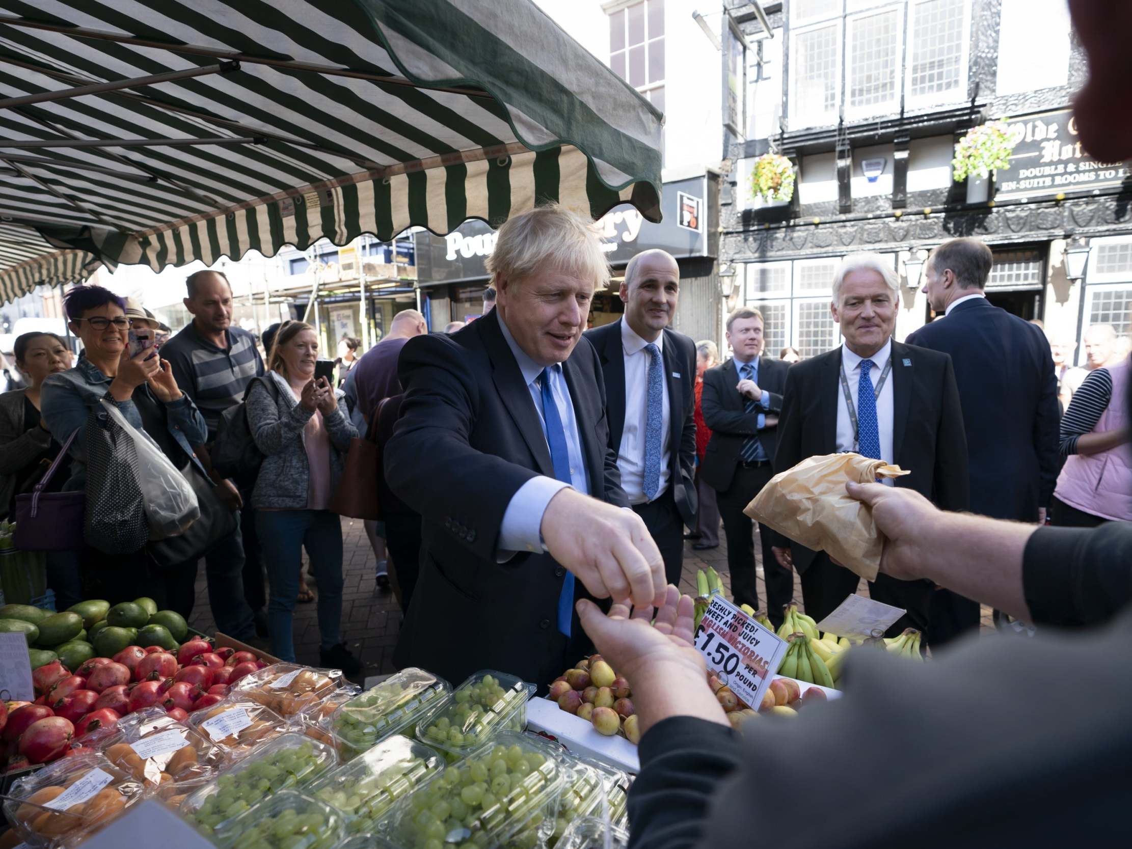 Boris Johnson shops at a fruit and veg stall in Doncaster