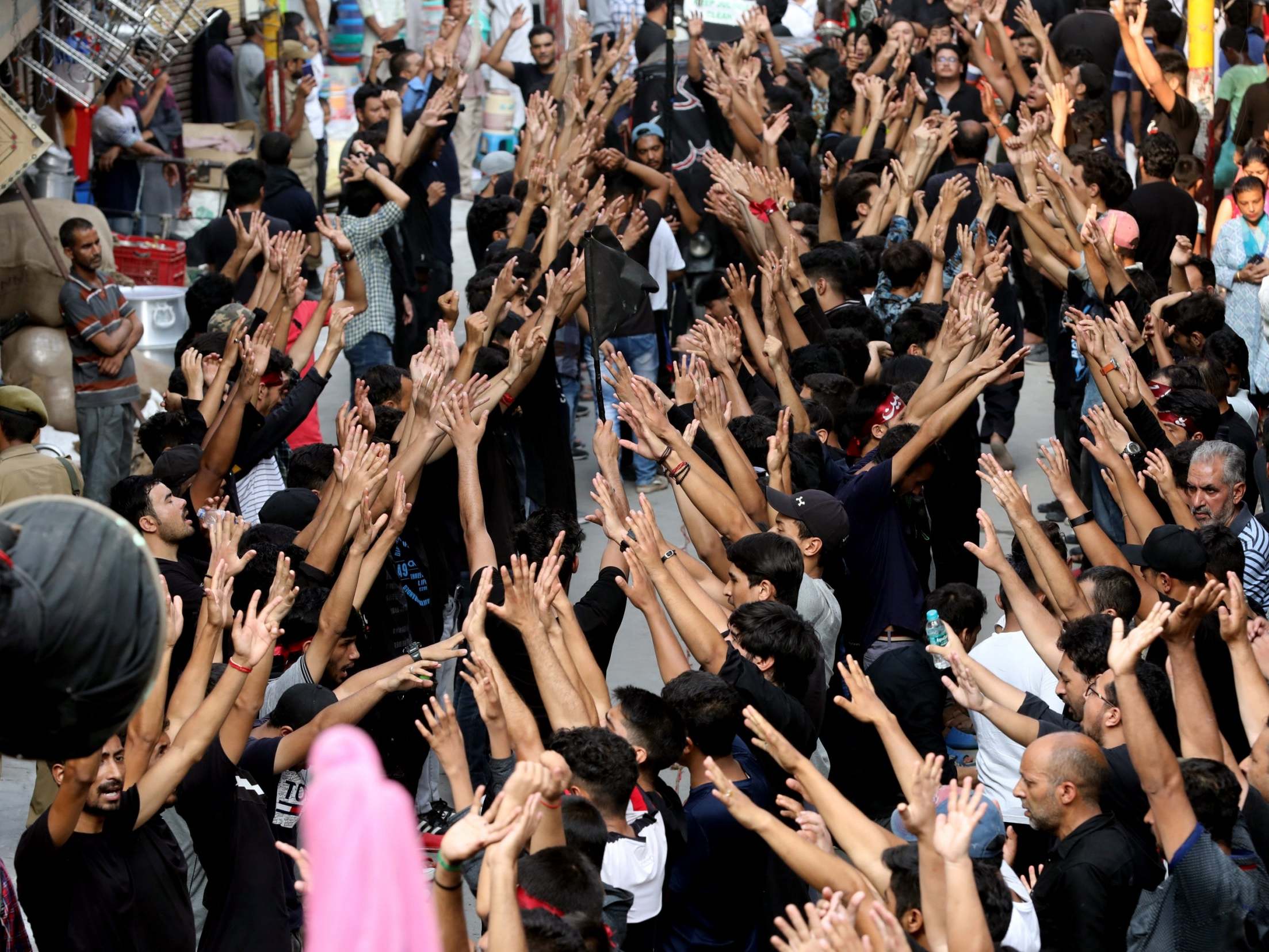 Indian Shiite Muslims mourn as they take part in a religious procession on the Ashura day - the 10th day of Muharram