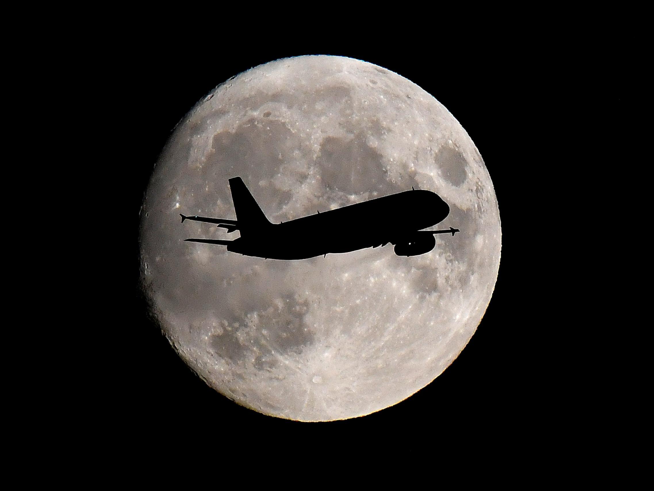 A plane is seen on approach to Heathrow airport, where expansion is subject to protest