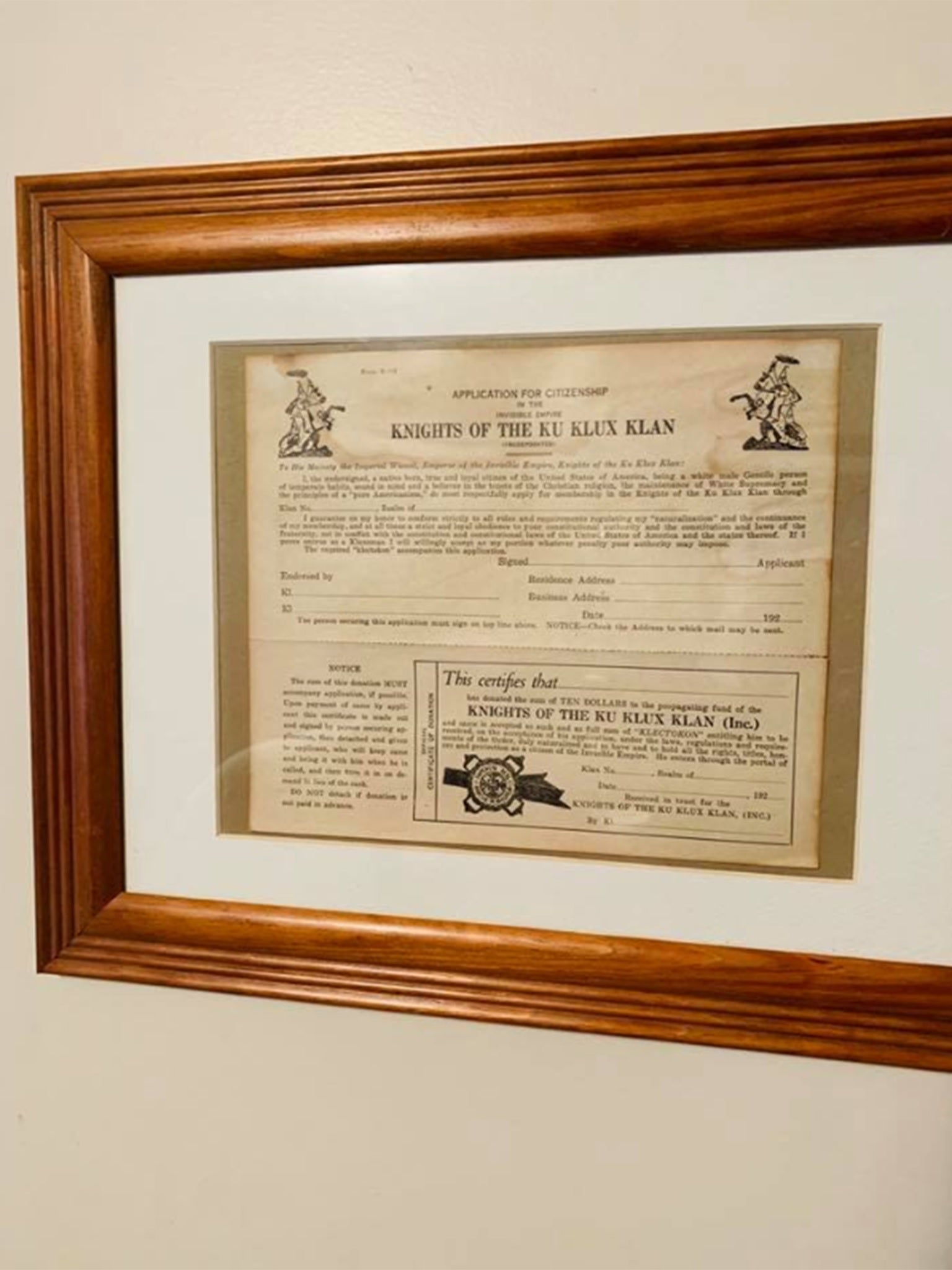 Anderson hung the framed KKK application in his bedroom