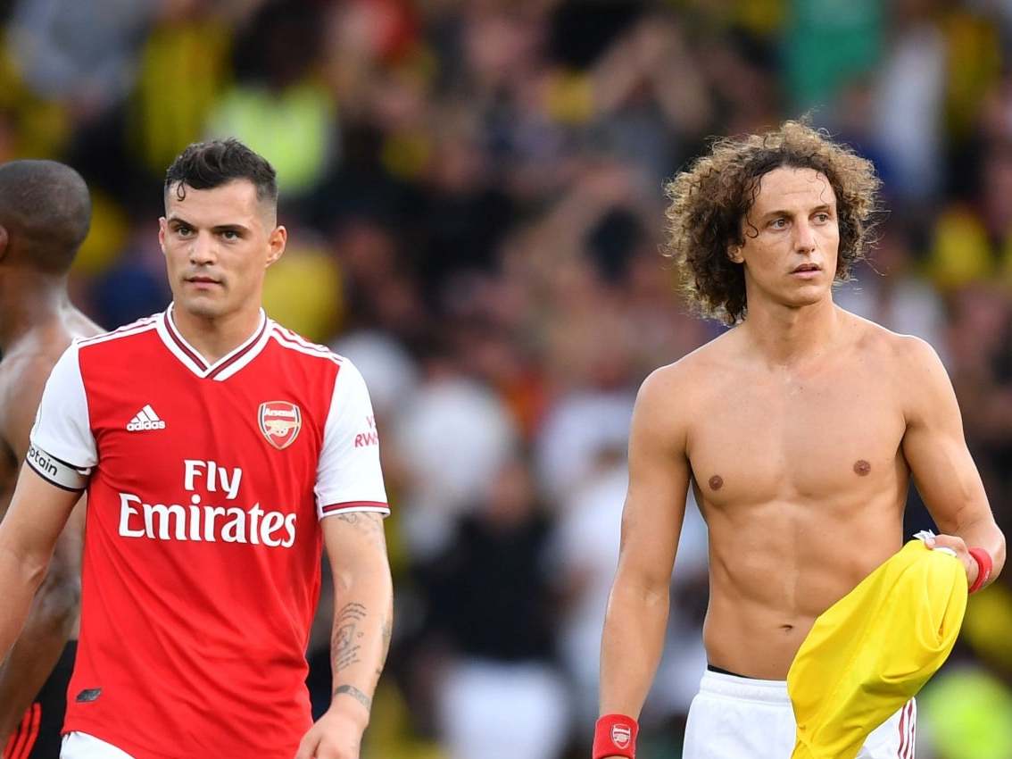 David Luiz and Granit Xhaka appear dejected