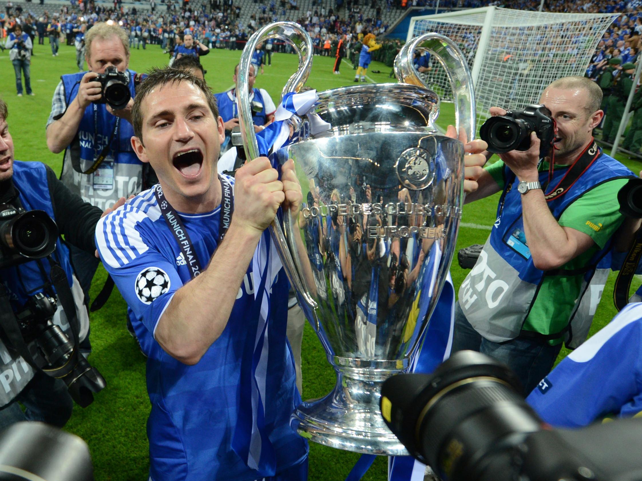 Chelsea's Frank Lampard holds the trophy