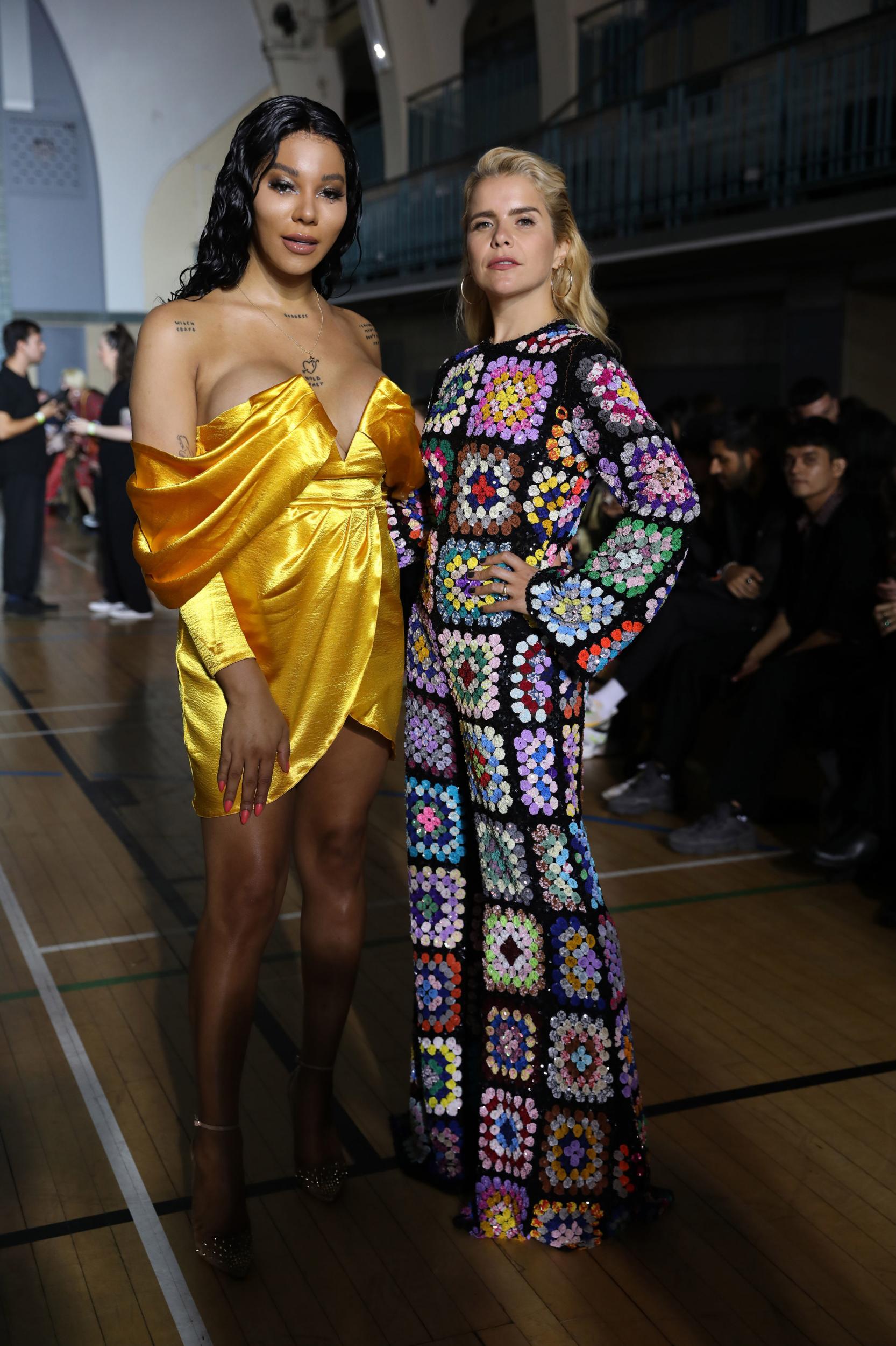The model and singer sat on the front row at the Ashish Spring/Summer 2020 show. While Faith opted for a multi-coloured crochet maxi dress, Bergdorf wore a gold mini dress with draped shoulder detailing.