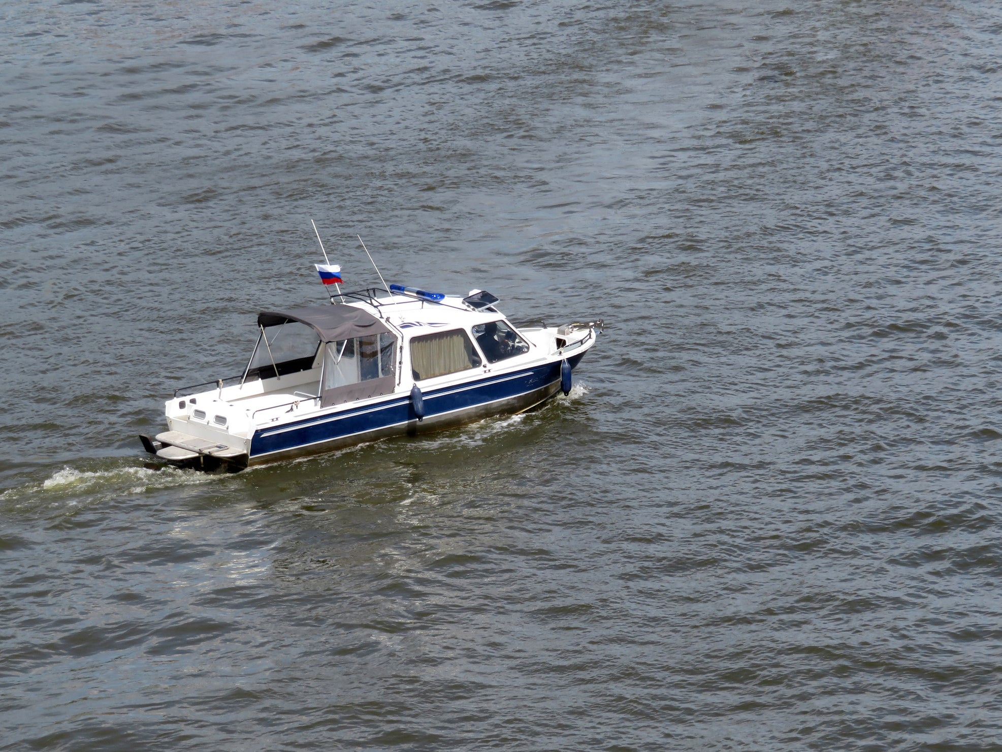 Russia patrol guards have detained two ships trespassing in its territorial waters.