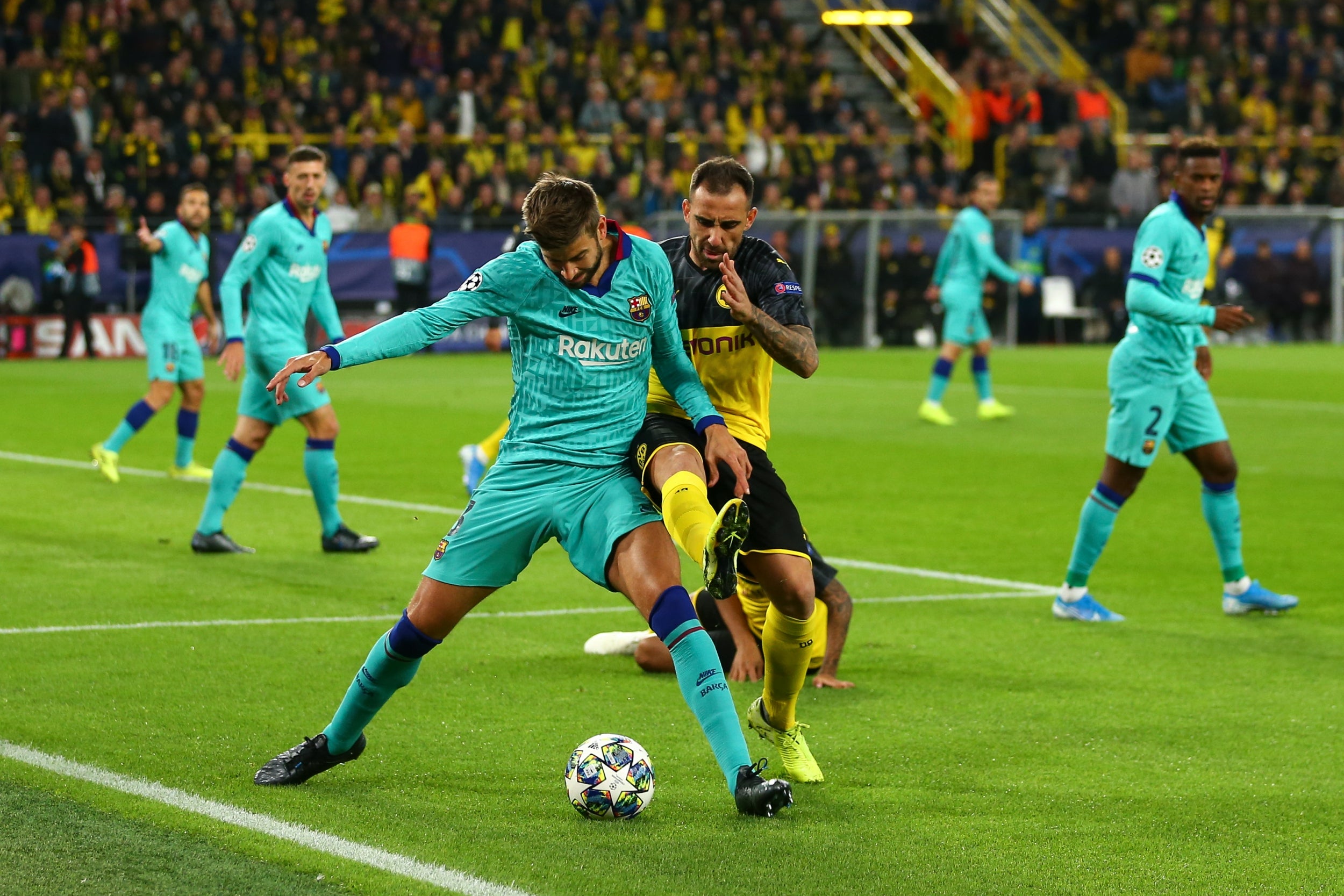 Pique in action against Borussia Dortmund in the Champions League (Getty)