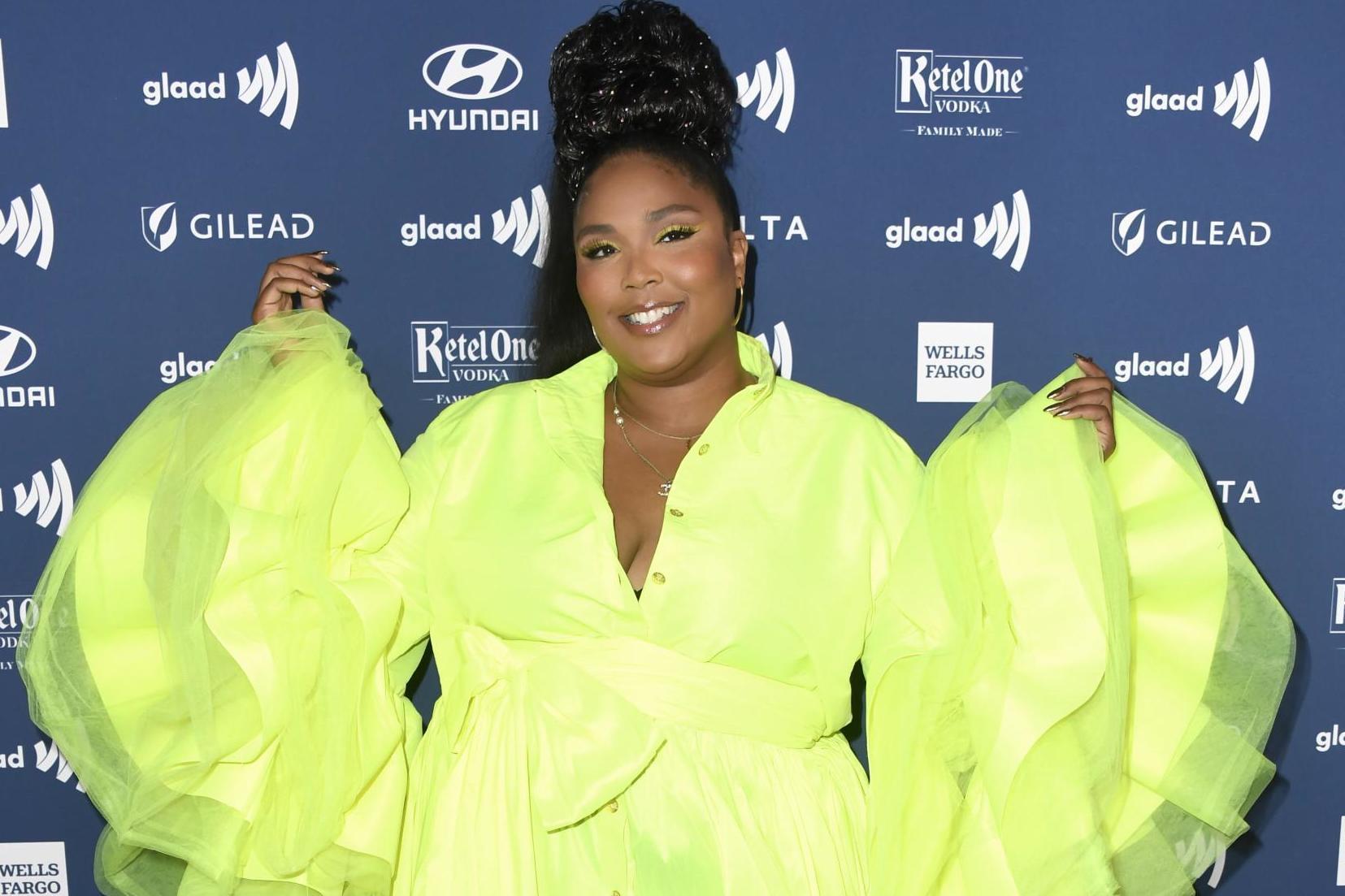 Lizzo angers fans by publicly shaming Postmates delivery courier (Getty)