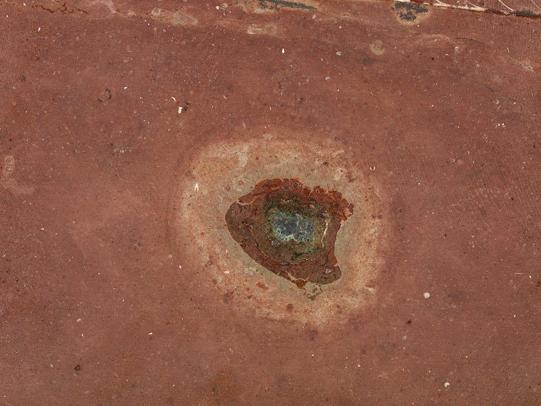 Pictured is a 466-million-year-old fossil meteorite created in the same asteroid collision that caused the dust that led to an ice age