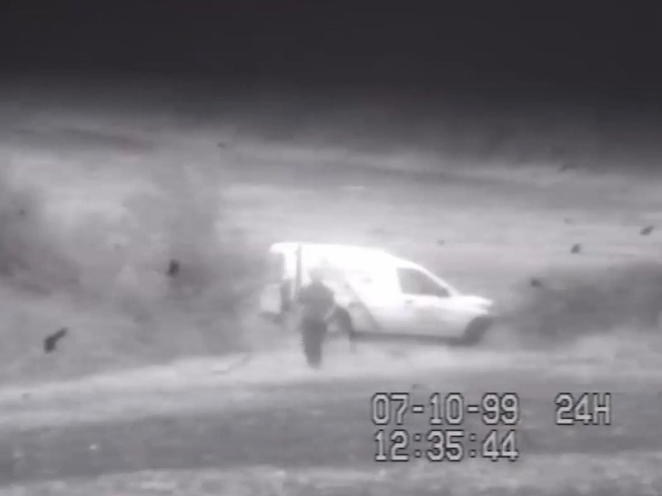 Screengrab taken from previously unreleased CCTV dated 7 October, 1999 of a driver stopping a van and looking around the entrance to the field in Creeting St Peter, Suffolk, where the body of 17-year-old Victoria Hall was found.