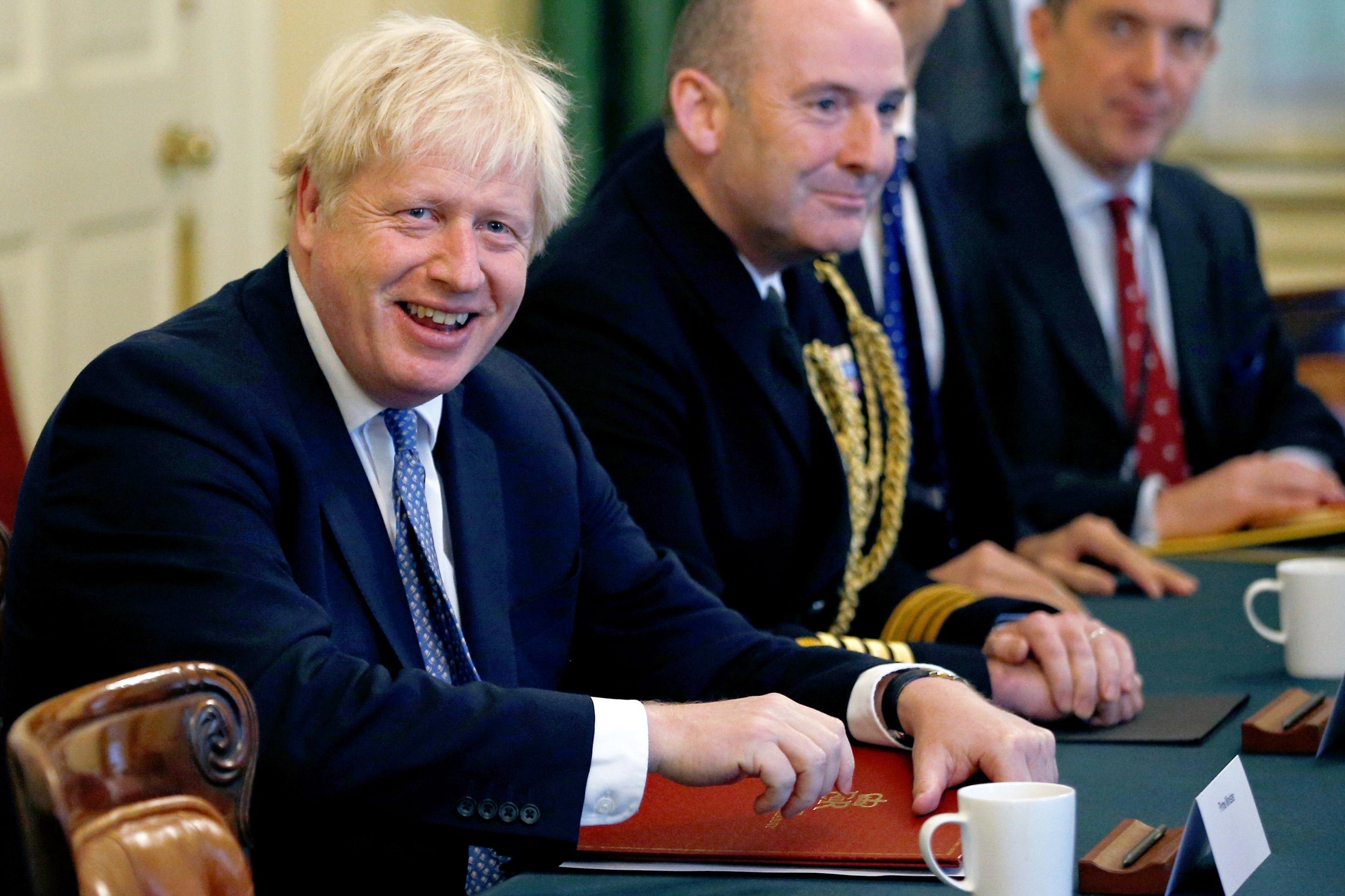 The prime minister at a roundtable with service chiefs at Downing Street yesterday