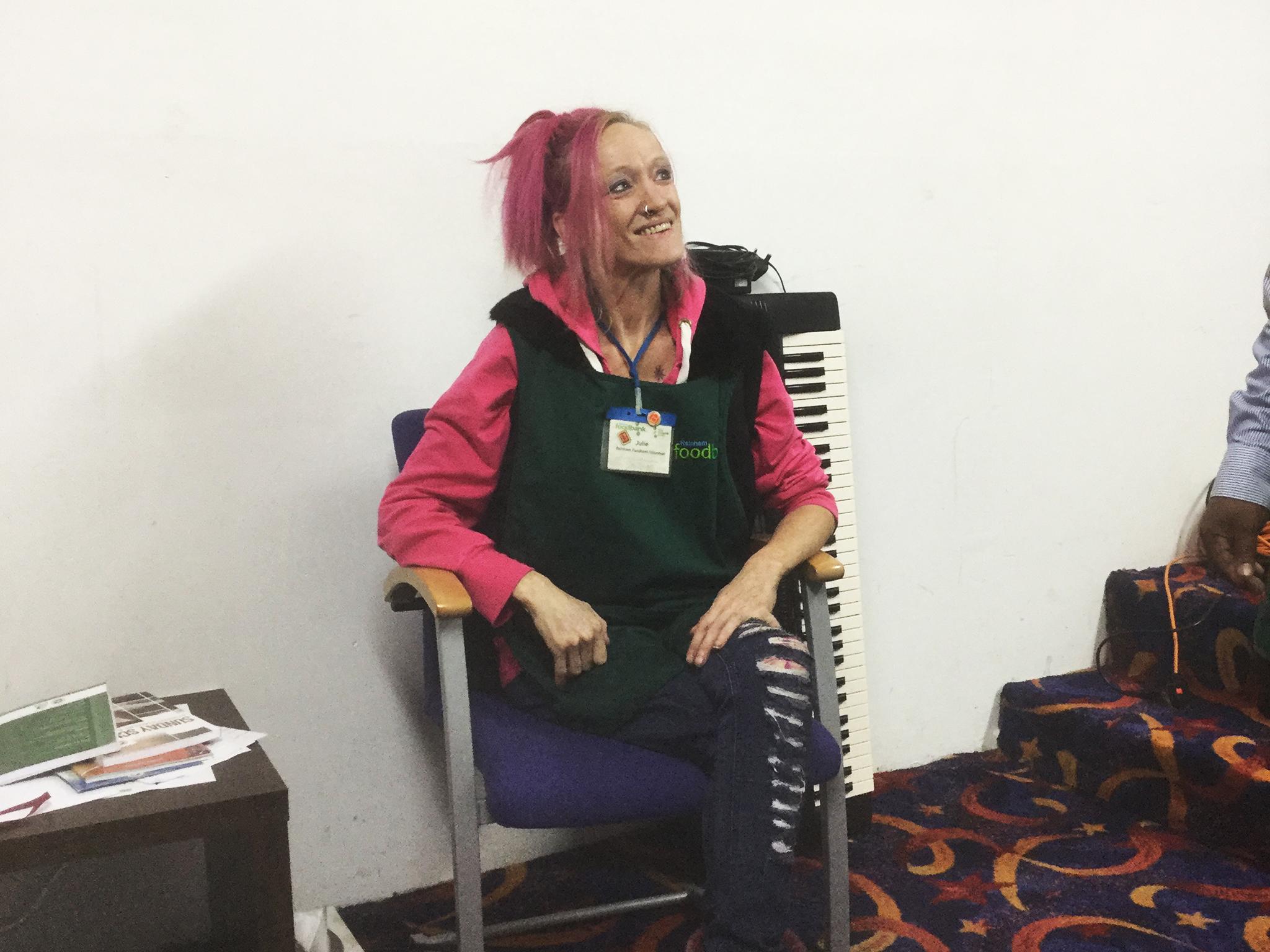 Julie Lawson volunteers at the food bank after being a client