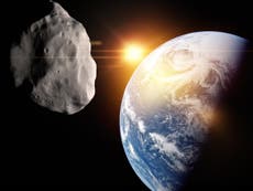 Asteroid flies by Earth closer than any seen before, Nasa says