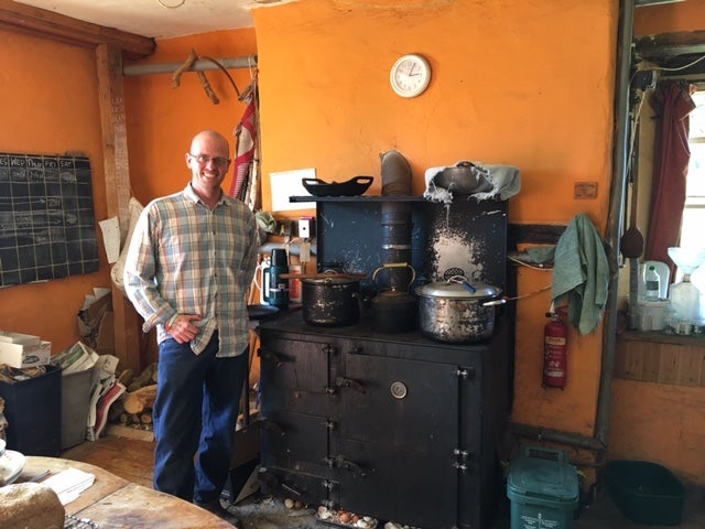 Lea Trainer in the communal farm house kitchen – complete with wood-burning oven