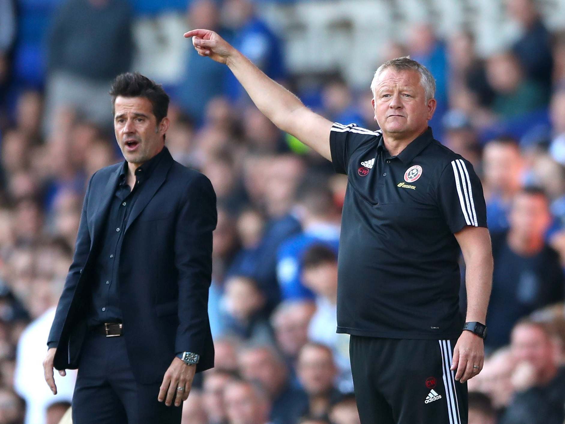 Marco Silva alongside Chris Wilder on the touchline