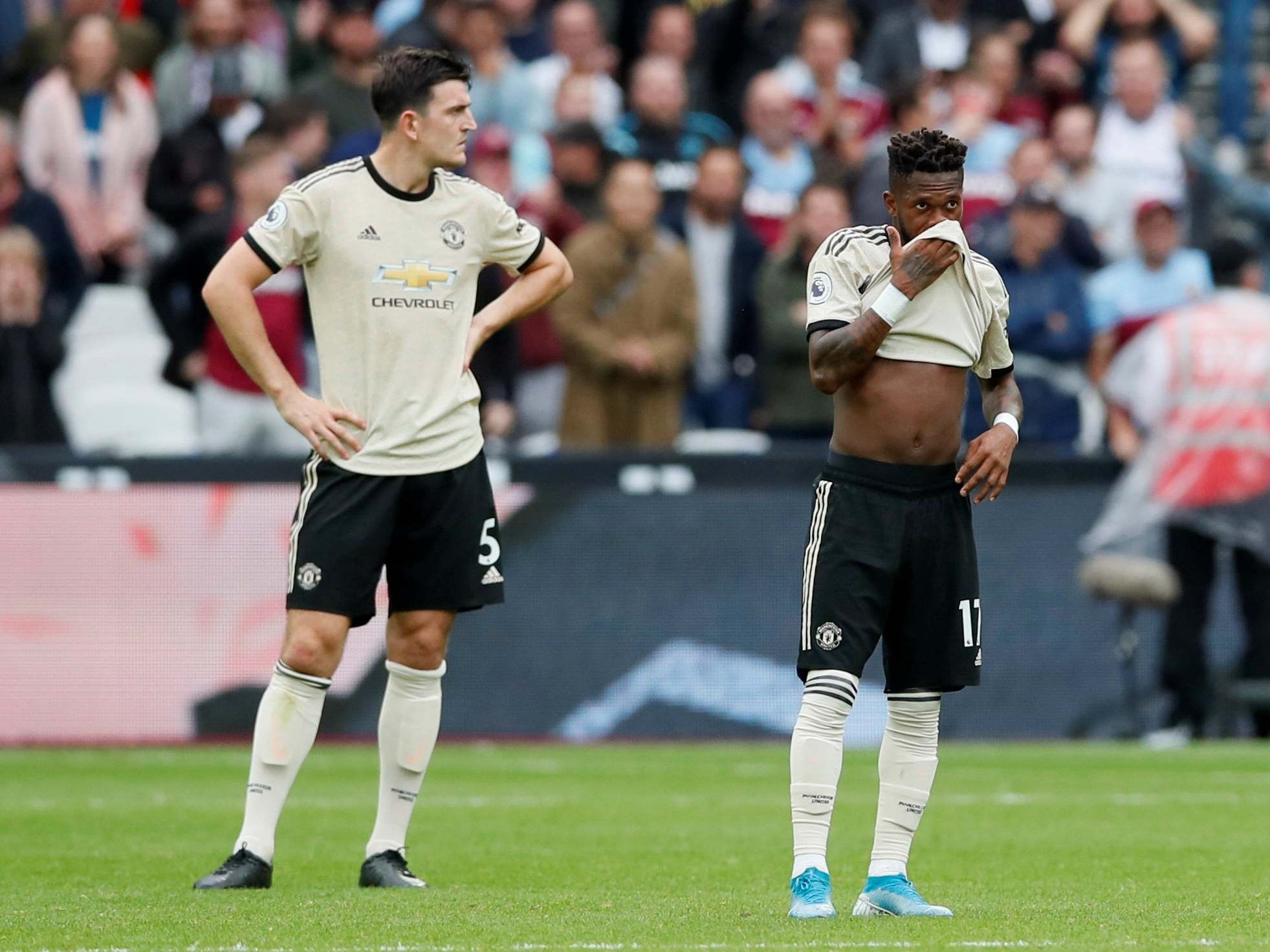 Manchester United’s Harry Maguire and Fred look dejected